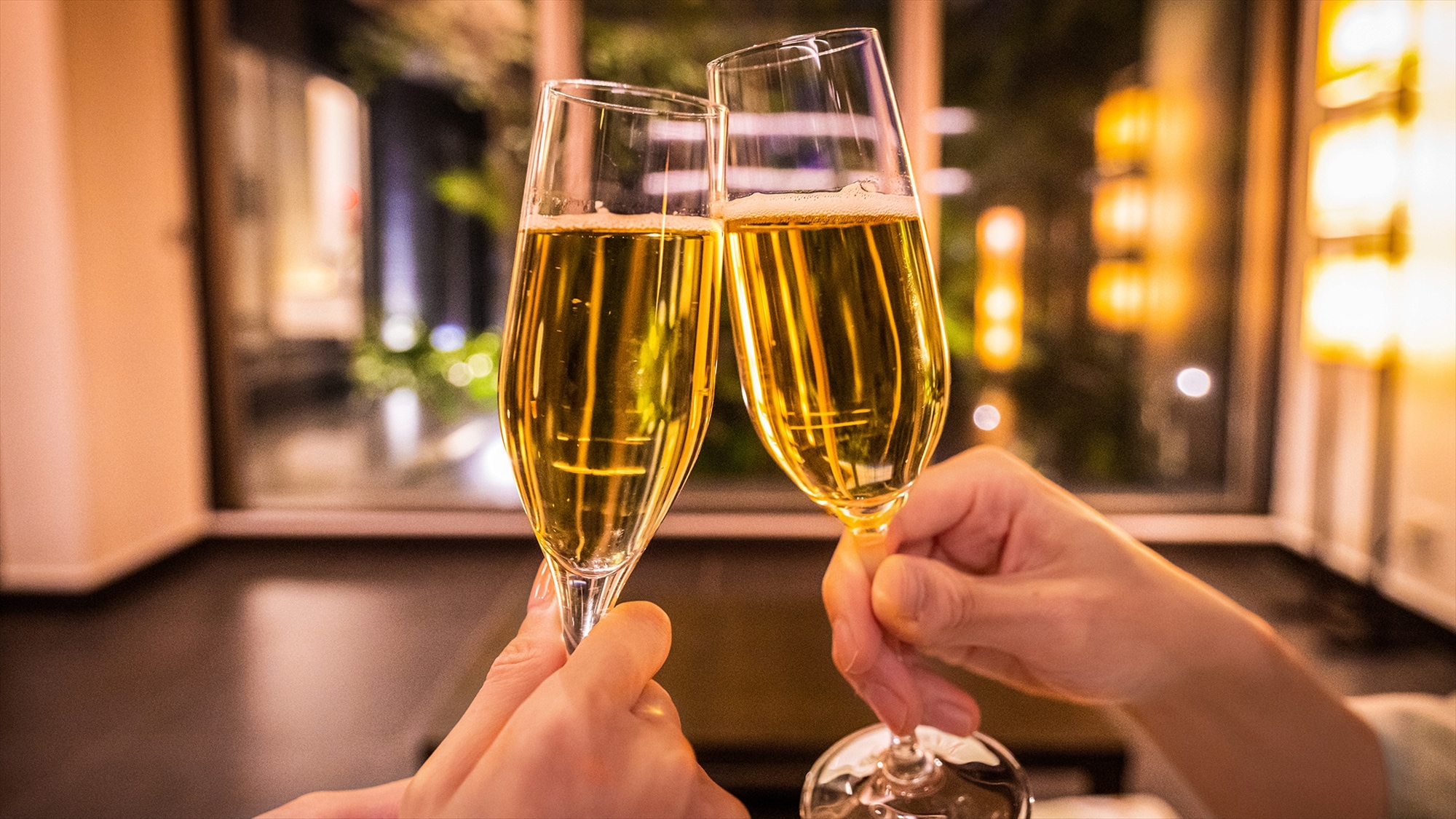 On a night out traveling, raise your glass and toast to the end of a fun day.