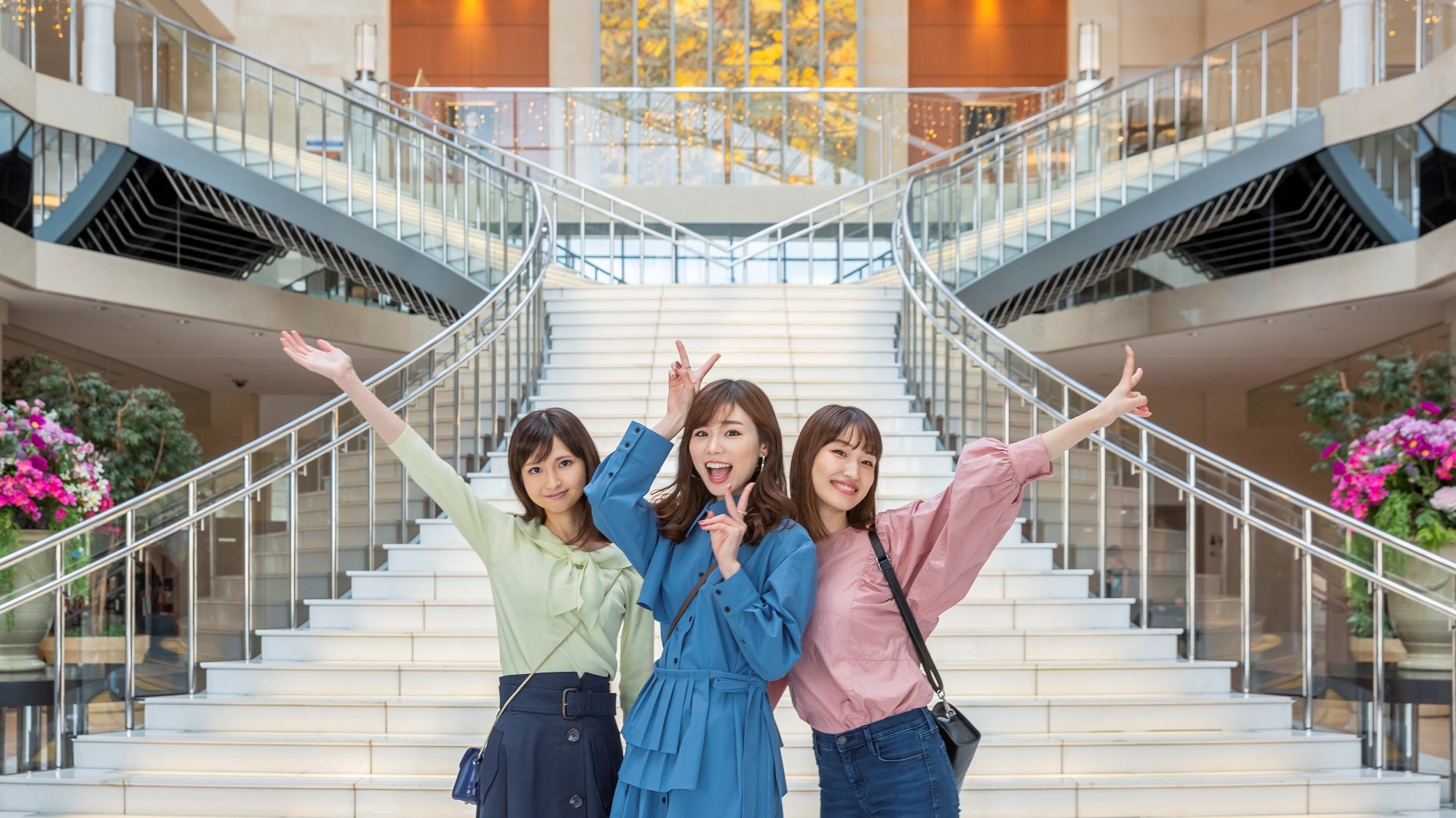 Commemorative photo taken in front of the grand staircase