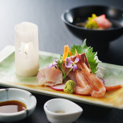 Fresh seasonal fish sashimi is available with all plans.