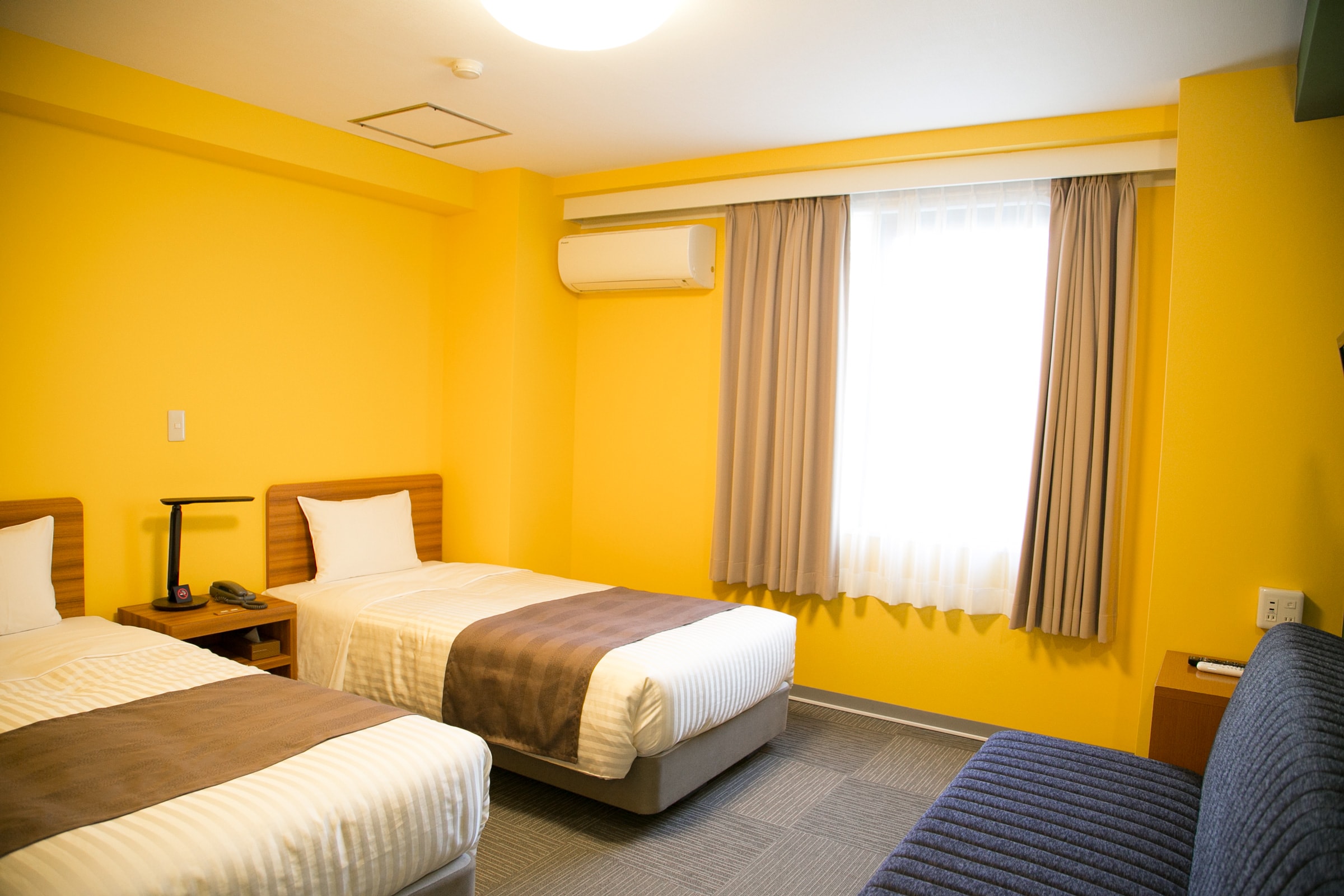 Twin / Triple Room (for 2 people)