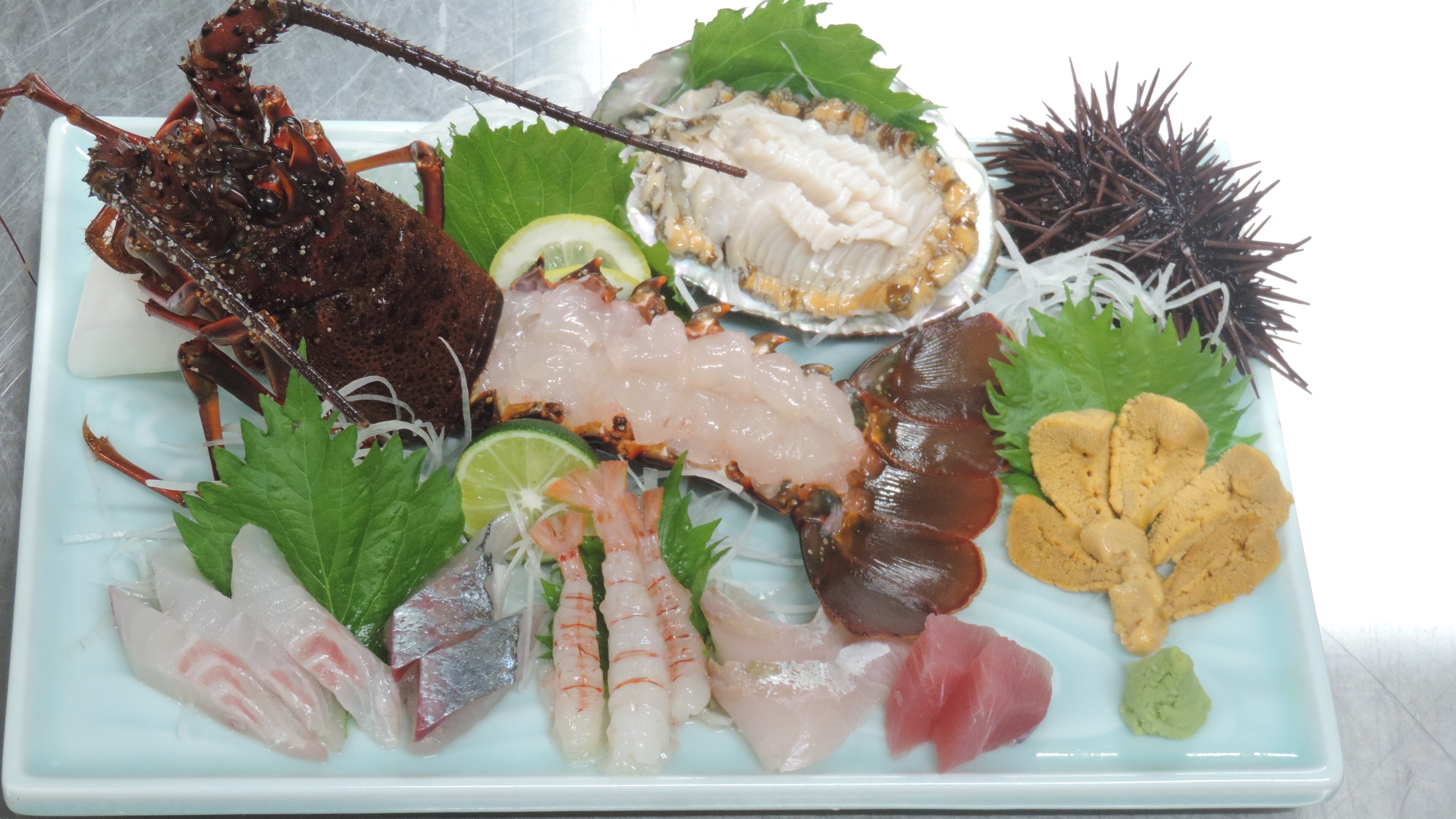 Lobster, red sea urchin, and abalone sashimi