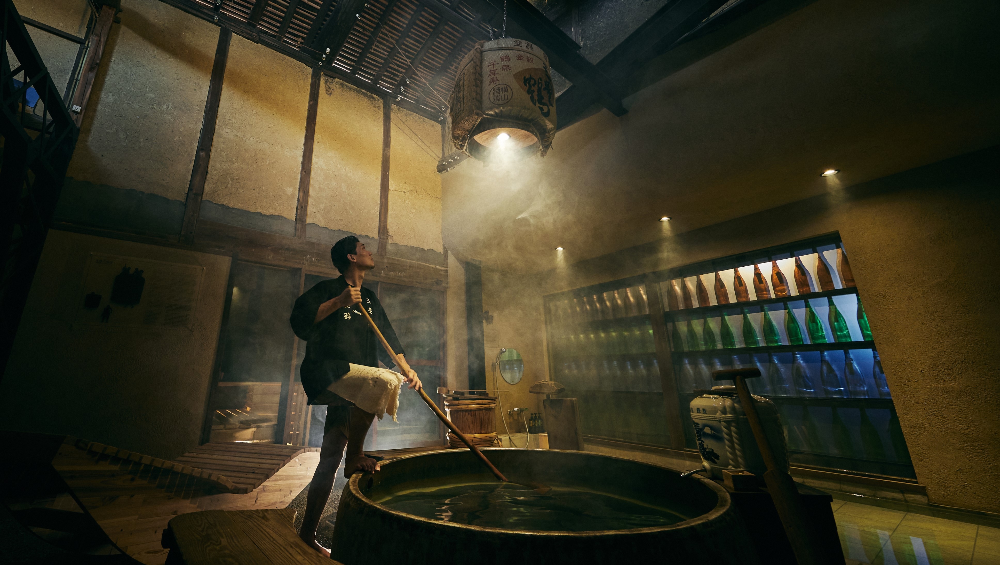 The master brewer mixes the sake