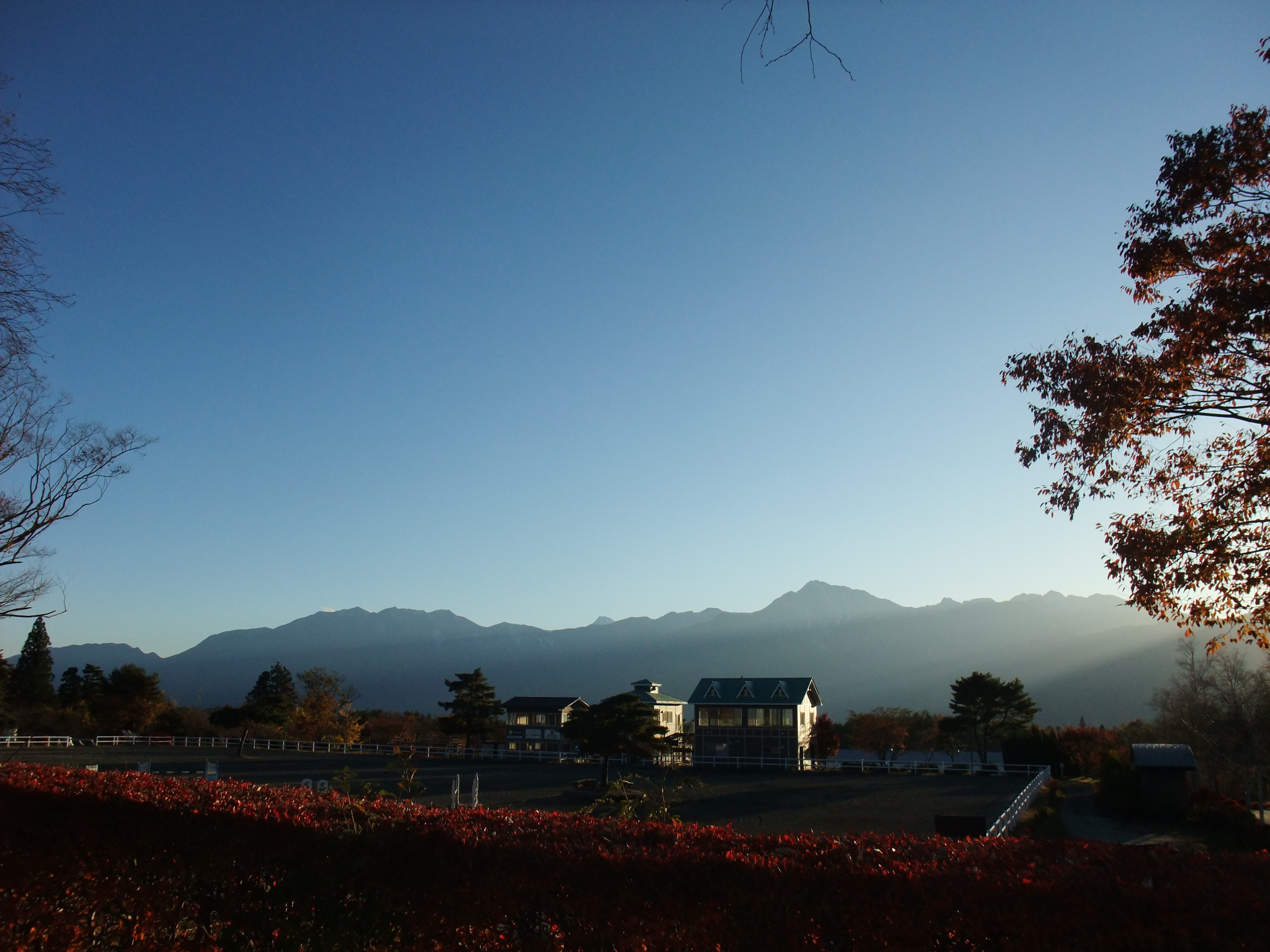 Autumn evening in the Southern Alps seen from the equestrian arena in front of Askott