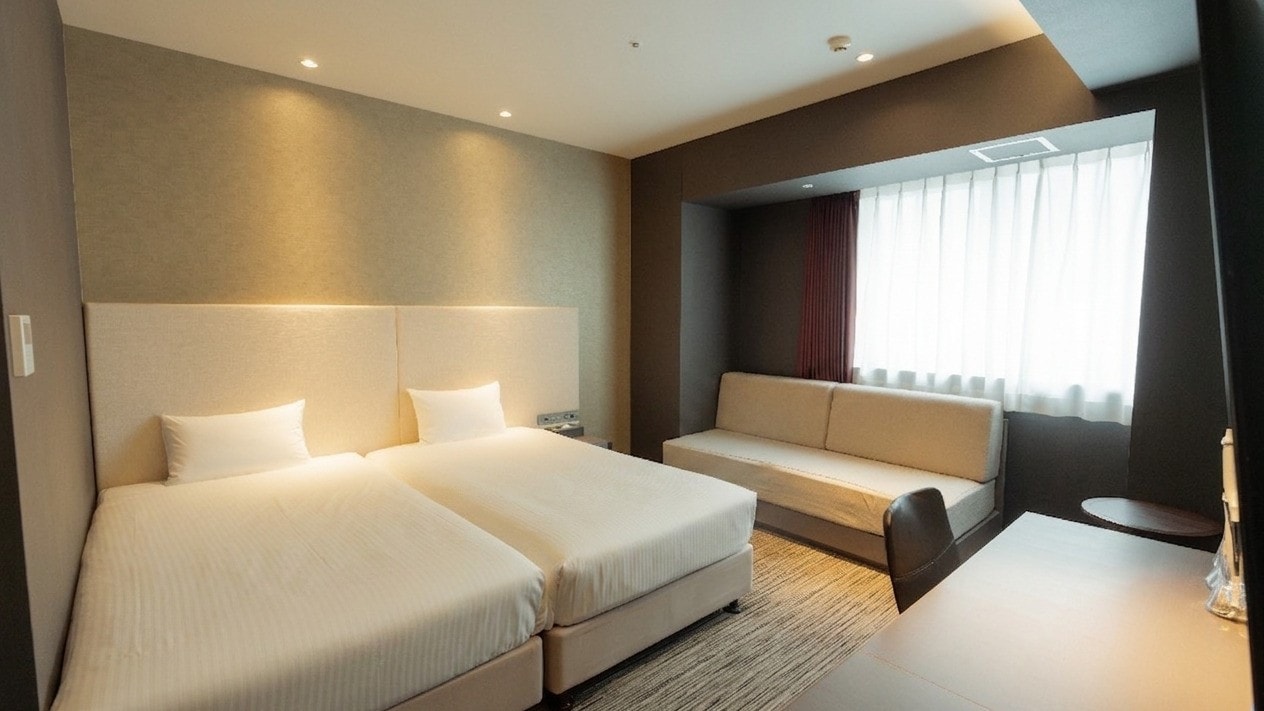 Semua tipe kamar dengan kata "Executive" di namanya terletak di lantai teratas hotel. Kamar Executive Twin: 24,78㎡