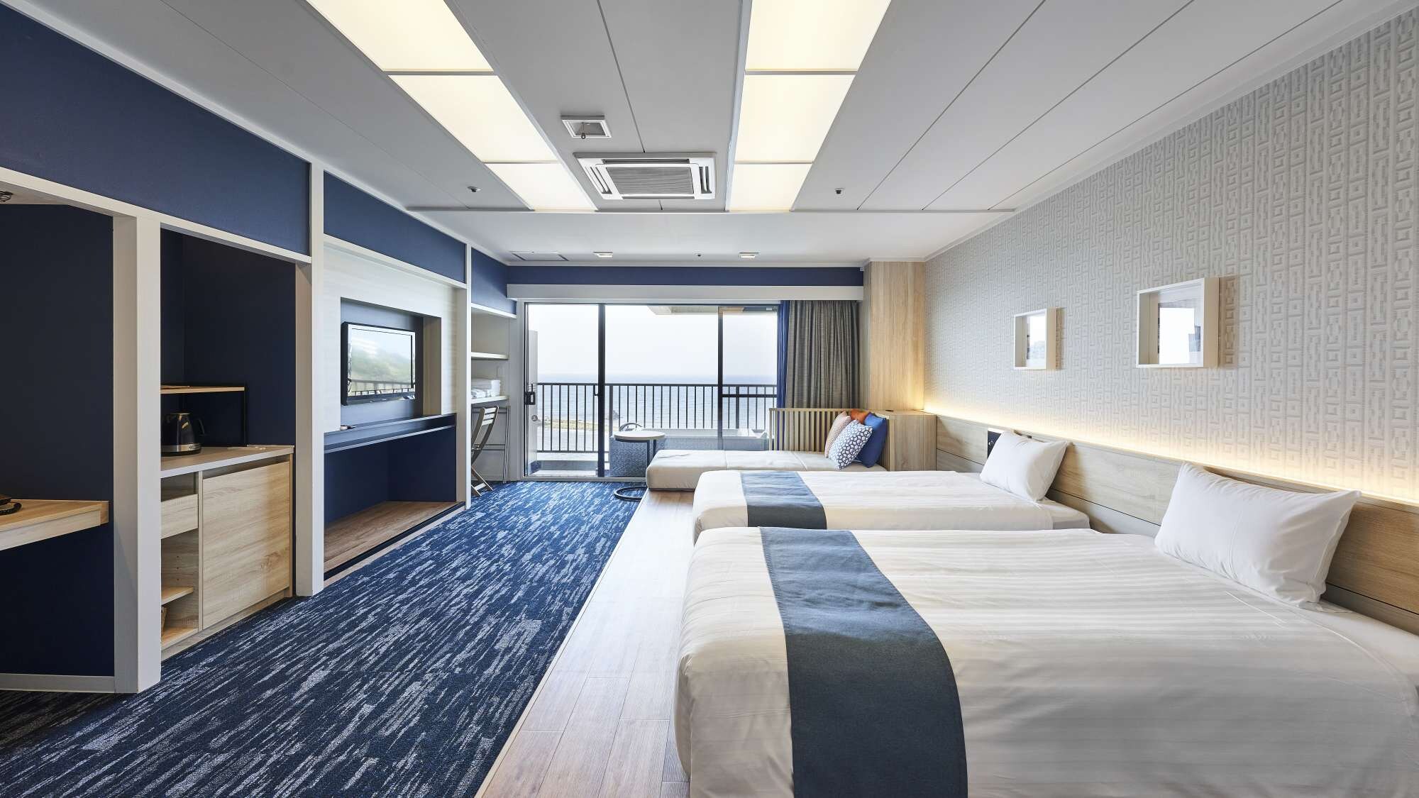 Kamar Twin Deluxe dengan Pemandangan Laut (dengan kamar mandi busa terbuka) untuk 1-4 orang