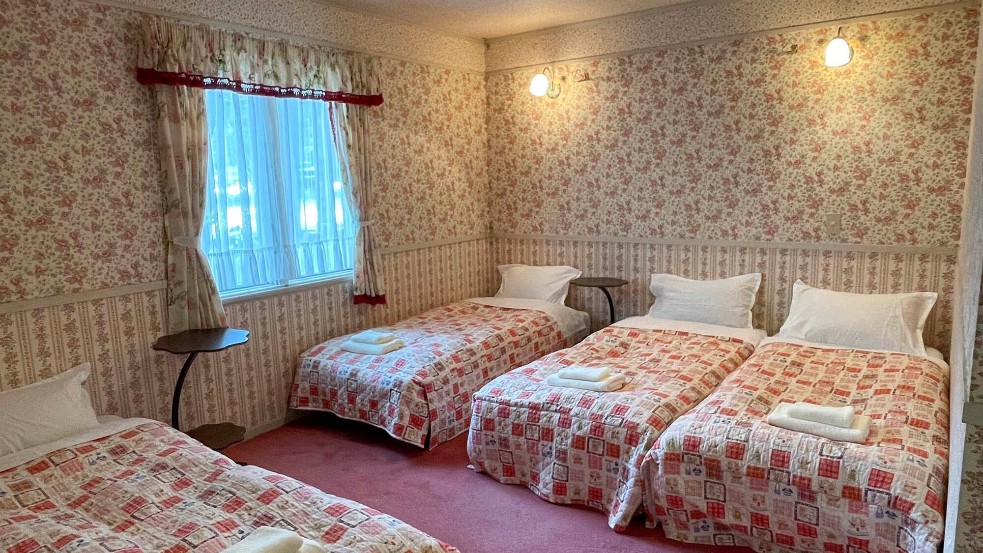 • [Main Building Quadruple Room] This room features four single beds (※The image may vary depending on the room).