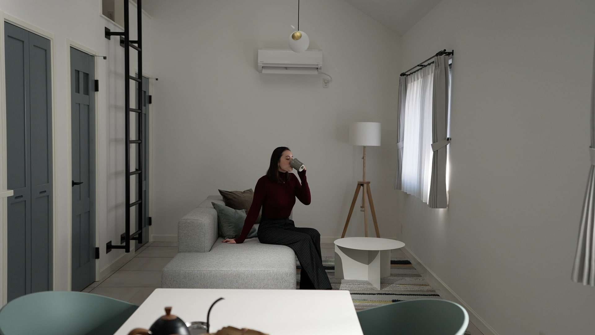 A simple, open room with high ceilings.
