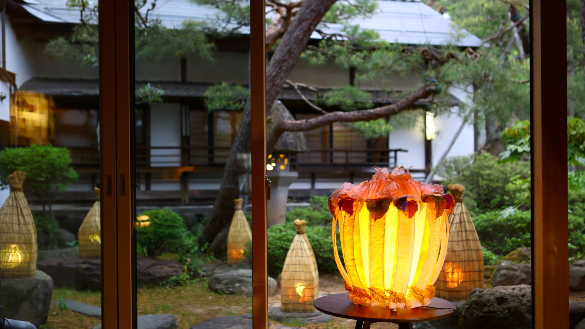 A large orange lampshade greets you at the entrance