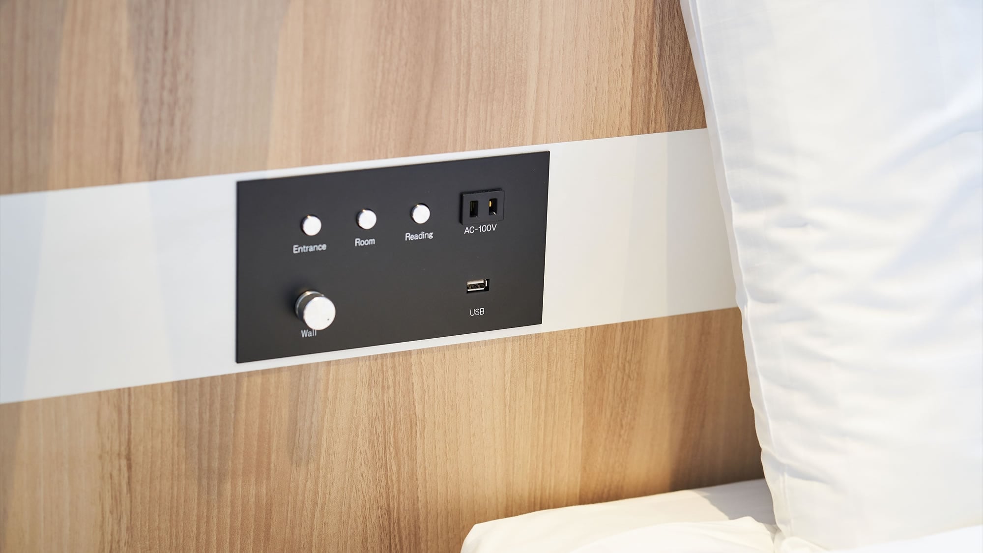 There is an outlet and a USB port at the bedside.