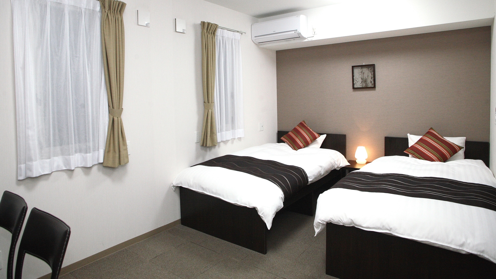 ห้องเตียงแฝด (23.6 ตารางเมตร) พร้อมเครื่องปรับอากาศส่วนตัวและ Wi-Fi