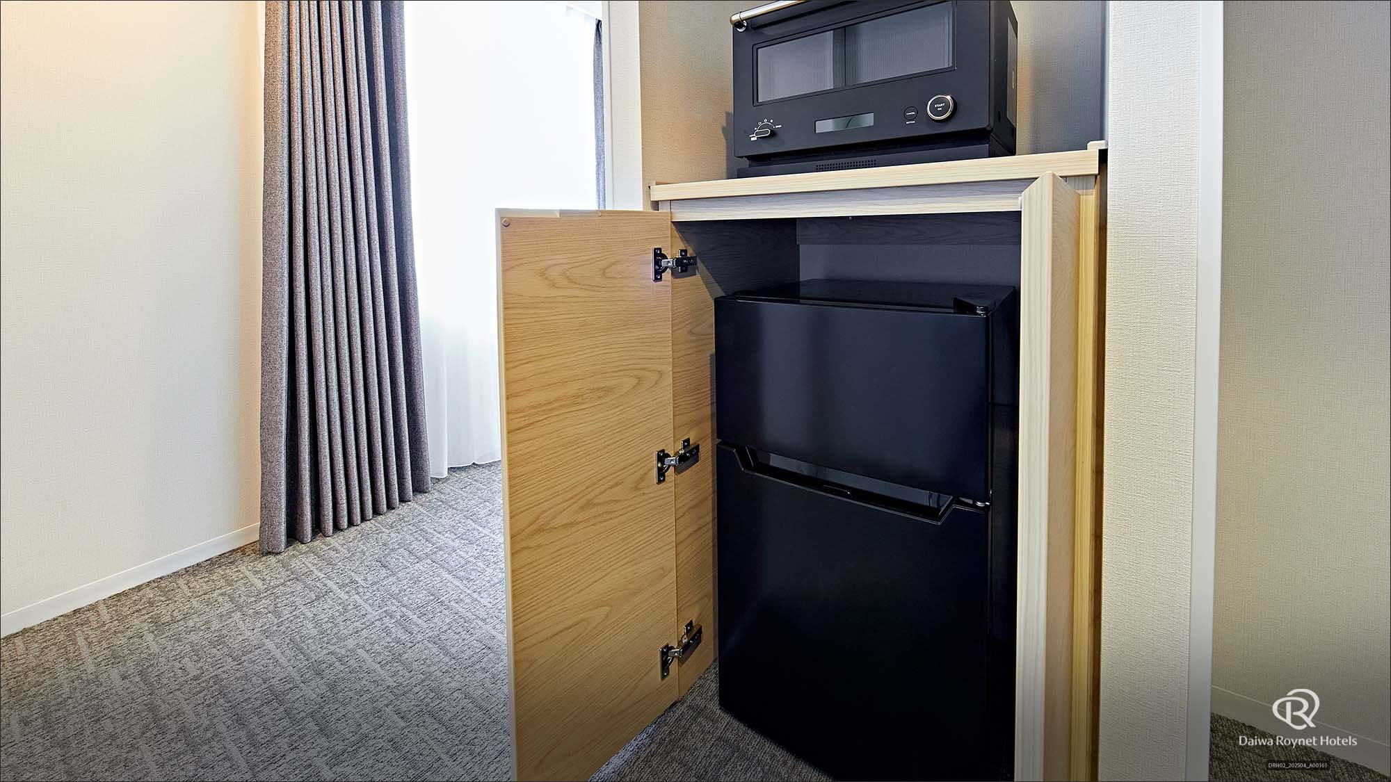Kamar Deluxe Twin: Microwave dan kulkas 2 tingkat
