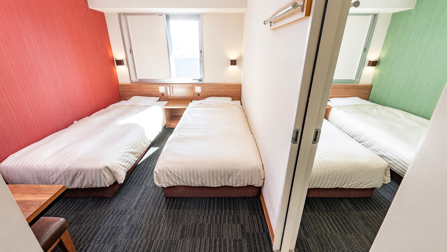 This room has two rooms with a door between them.