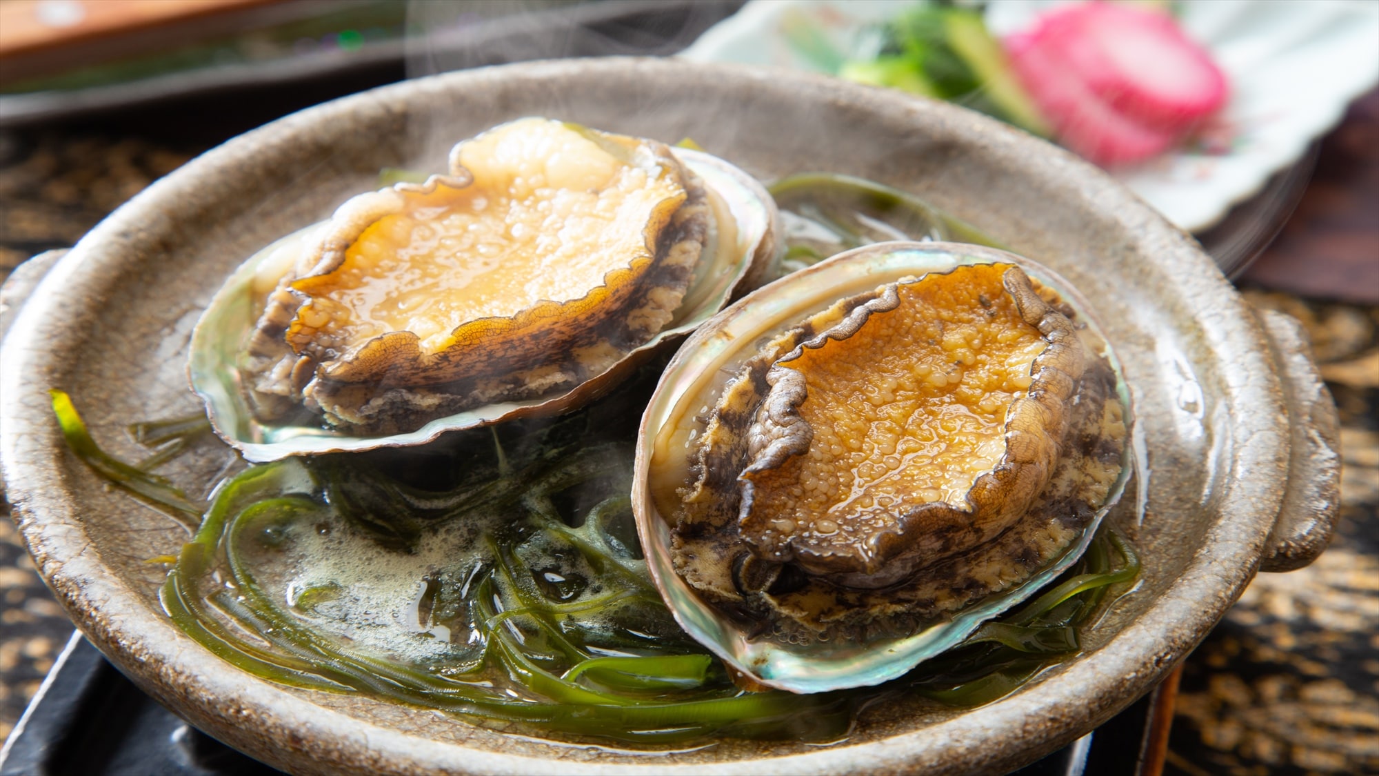 Abalone grilled on a ceramic plate