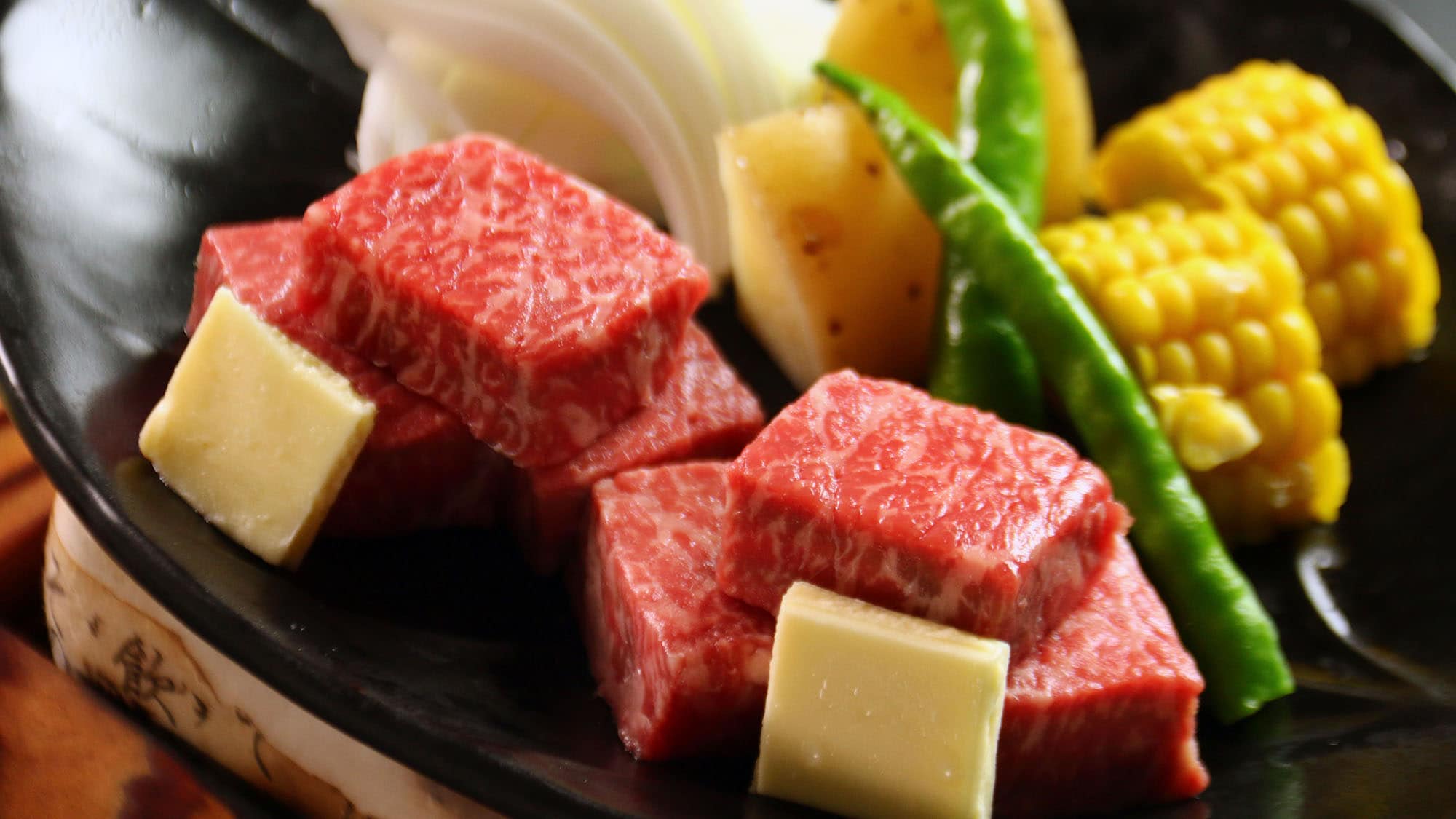 *Dinner example: Hida Shikizen (Hida four seasons meal) on a ceramic plate, Hida beef sirloin steak for two
