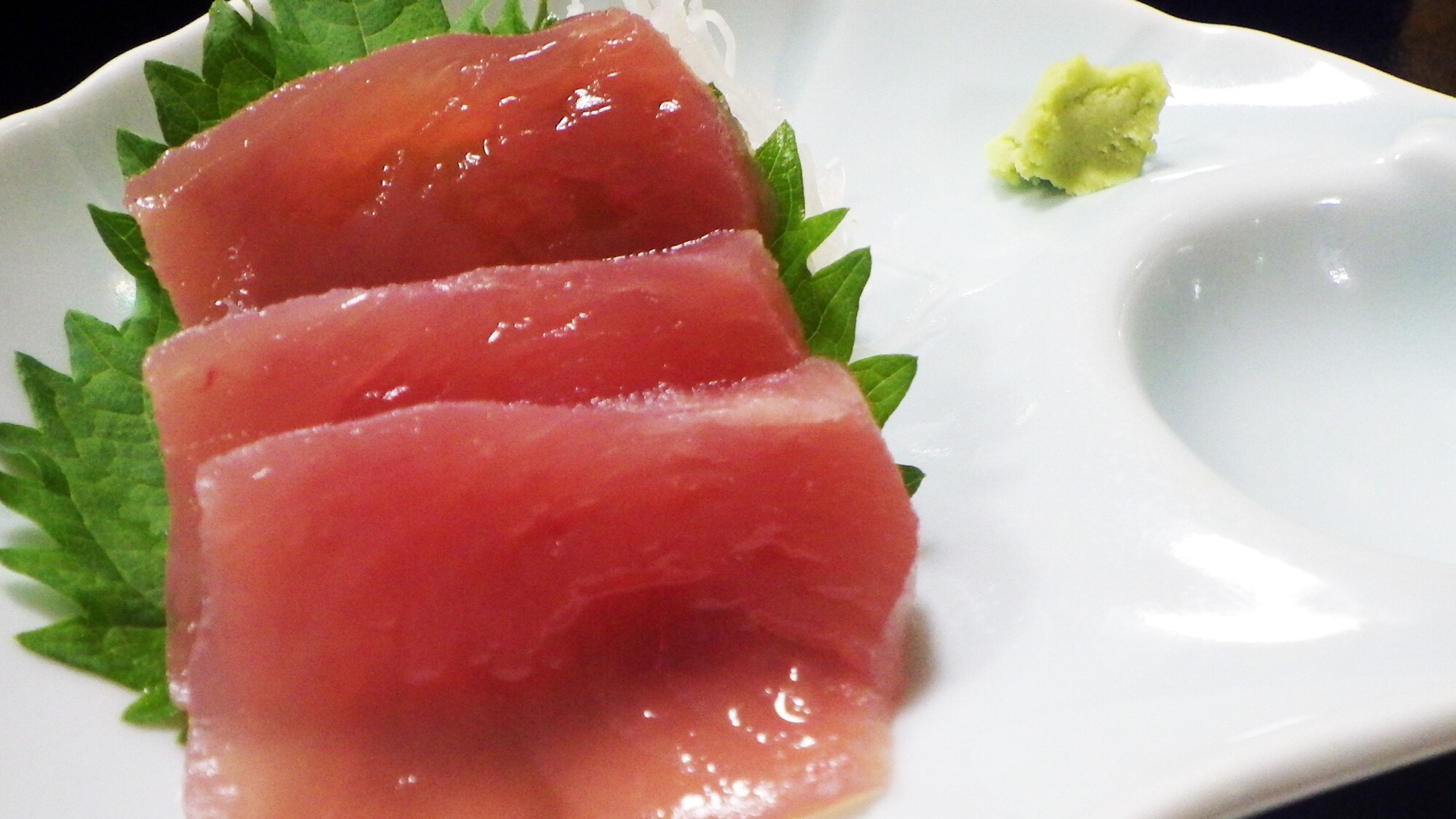 *Dinner (example): Fresh sashimi changes daily. This is tuna sashimi.
