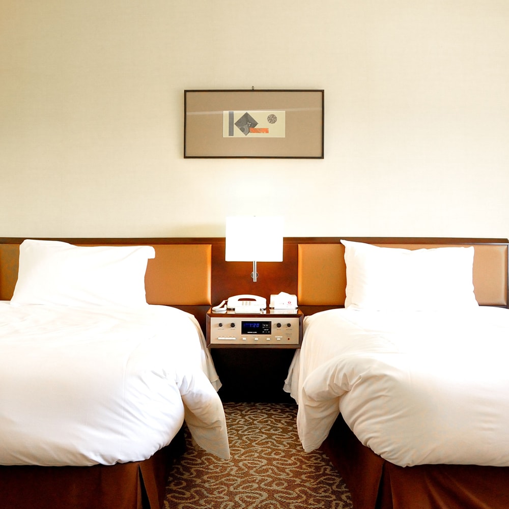 Superior Twin Room (9th to 12th floors) Size: 26 square meters Bed width: 200cm x 110cm