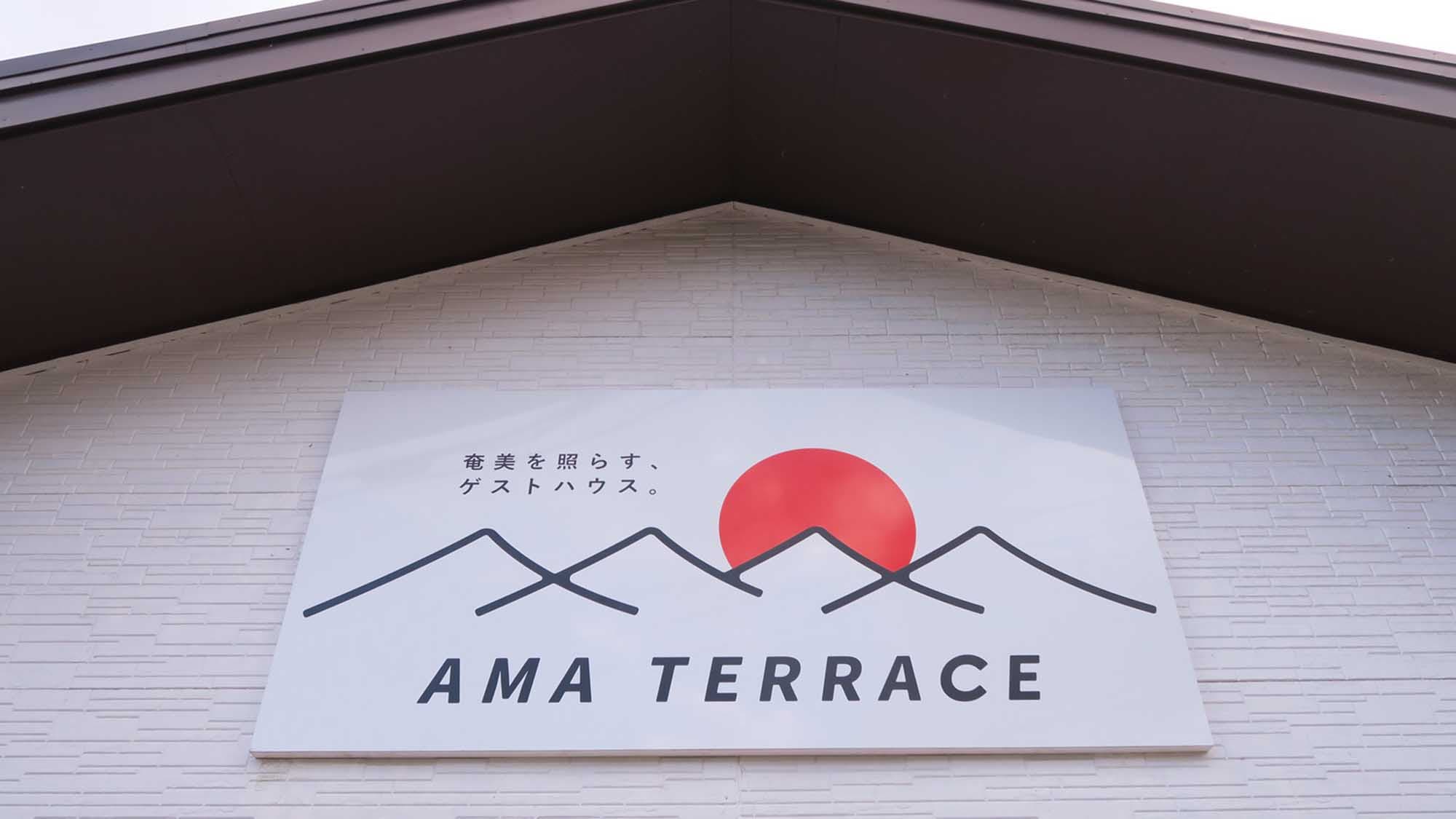 ・ [Exterior of the building] Front entrance signboard, sunrise mark