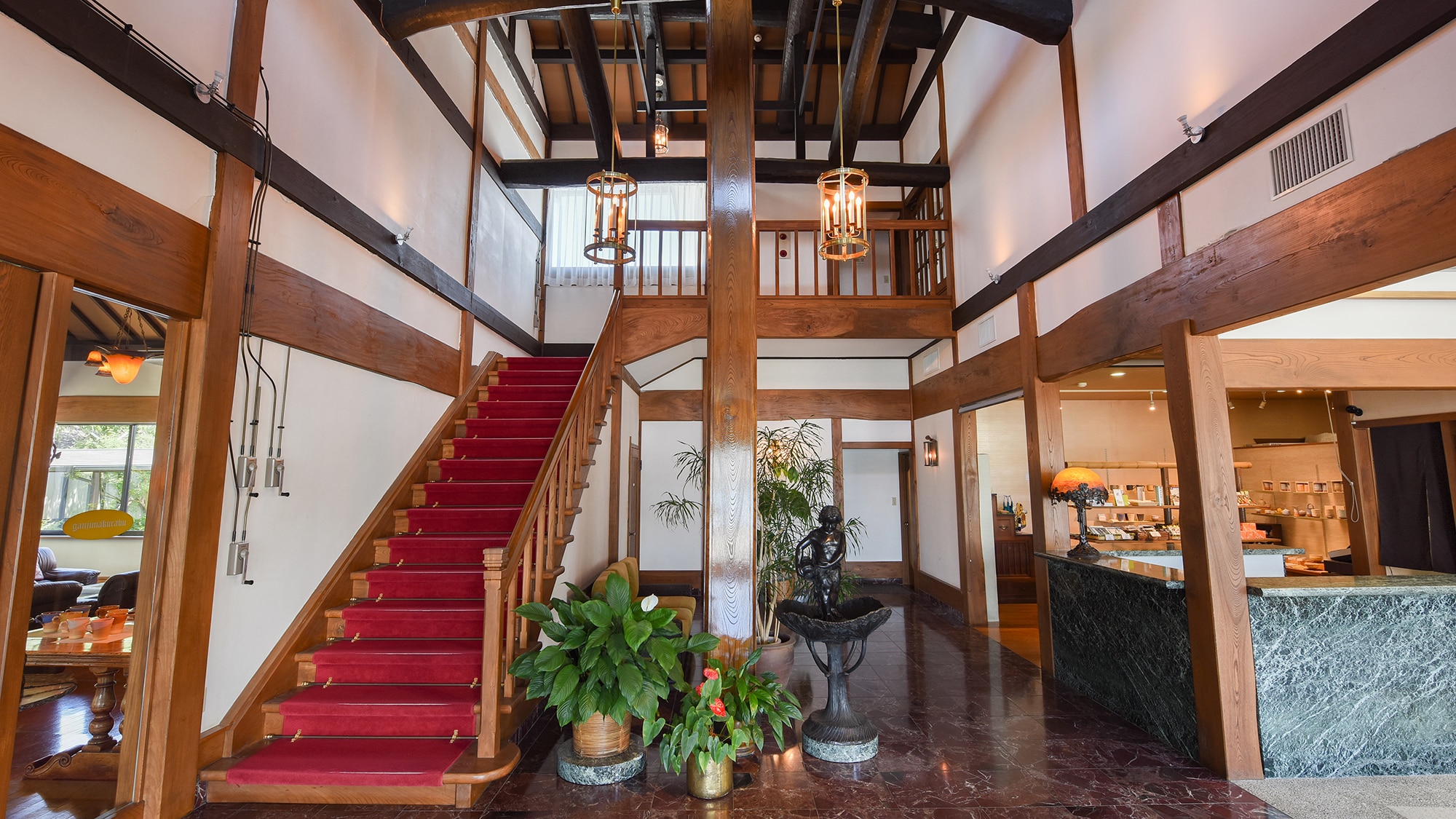 [Front desk/lobby] The lobby is located at the stained glass entrance.