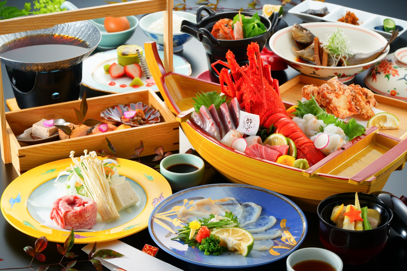 Oita Wagyu beef and thinly sliced puffer fish. A hearty dish! Whole lobster sashimi