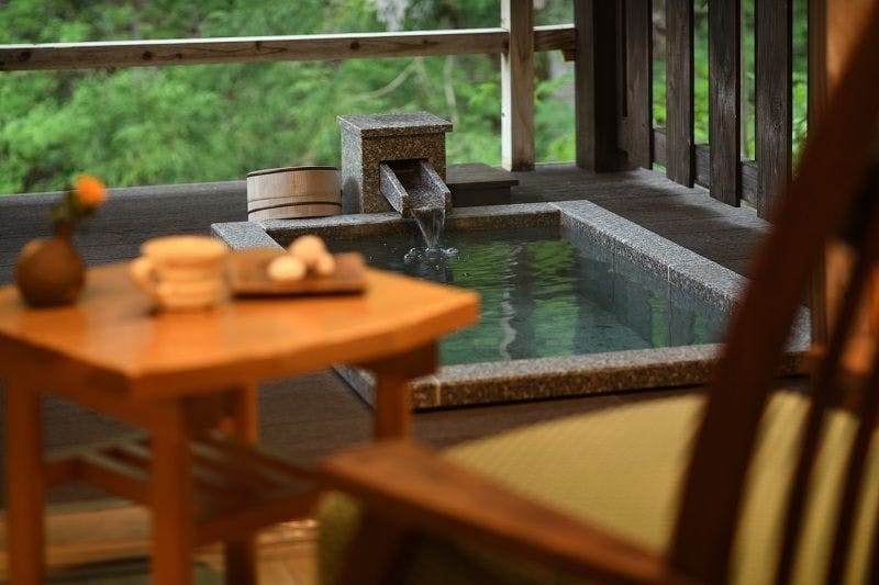 A detached "water pool" with an open-air bath