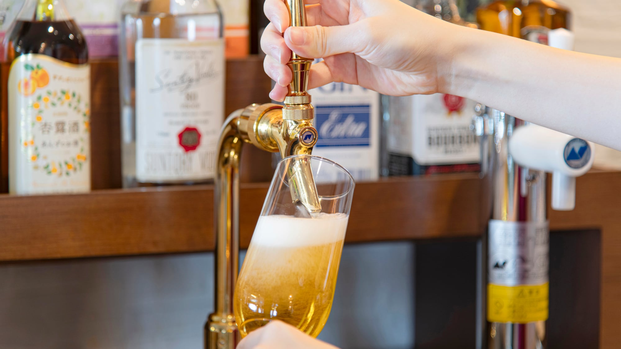 Enjoy the creamy foam that only a beer server can produce.
