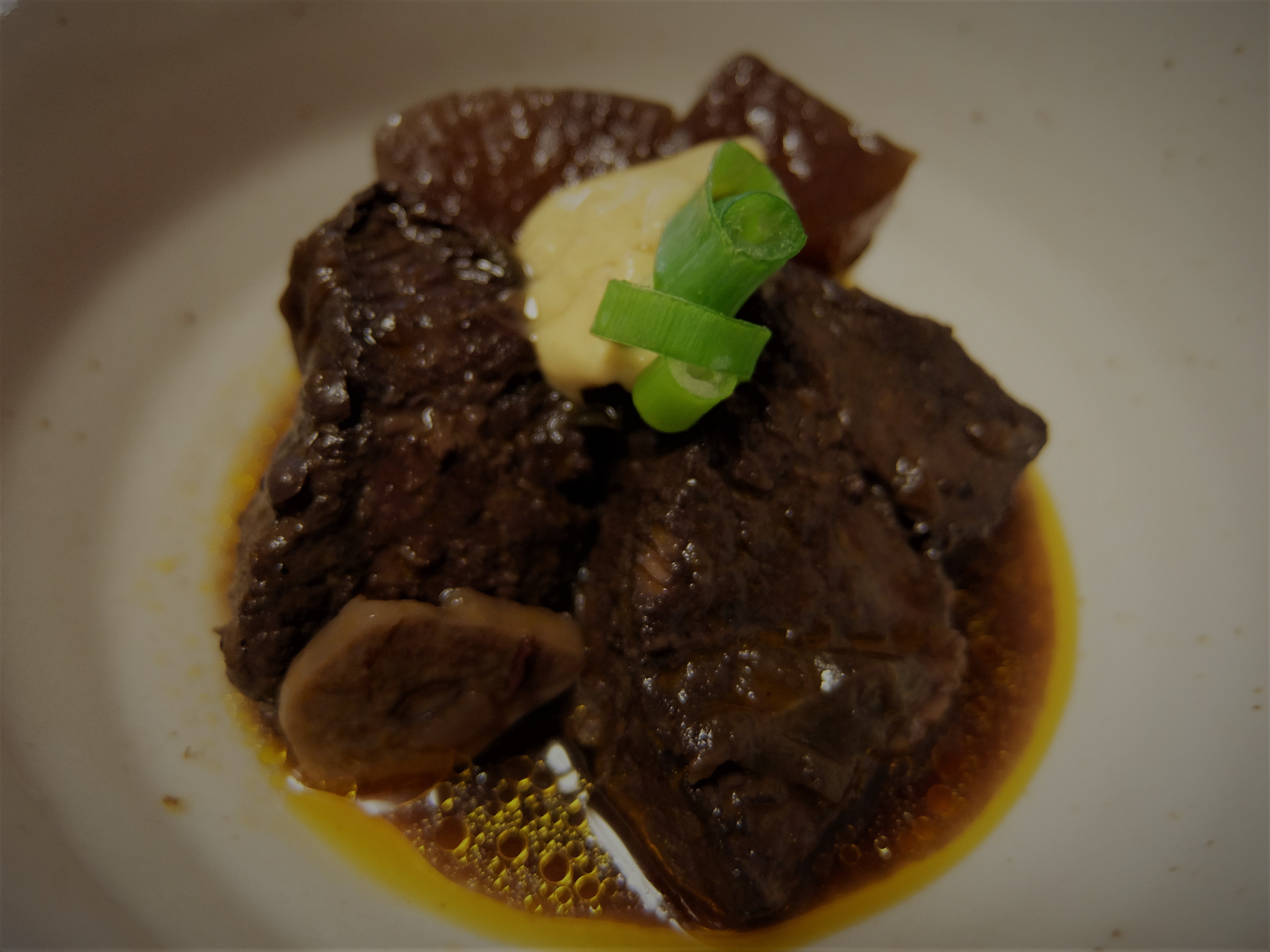 Pork stewed in red wine