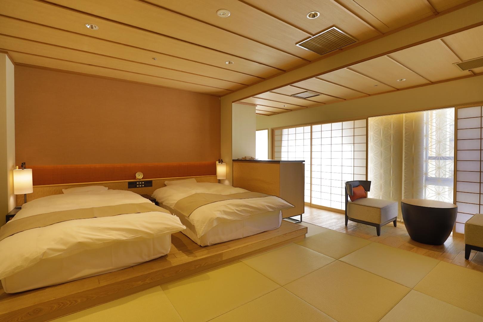 Modern Japanese-Western style room (Ryukyu tatami 8 tatami mats + bed/51 square meters) [Tokiwadai] Non-smoking