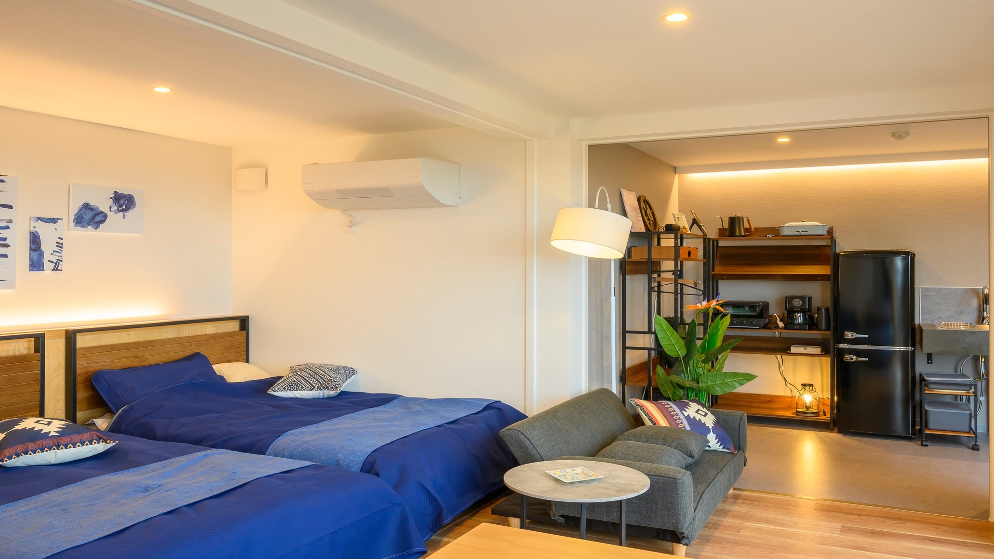 A spacious and comfortable private space with a kitchen and living room.