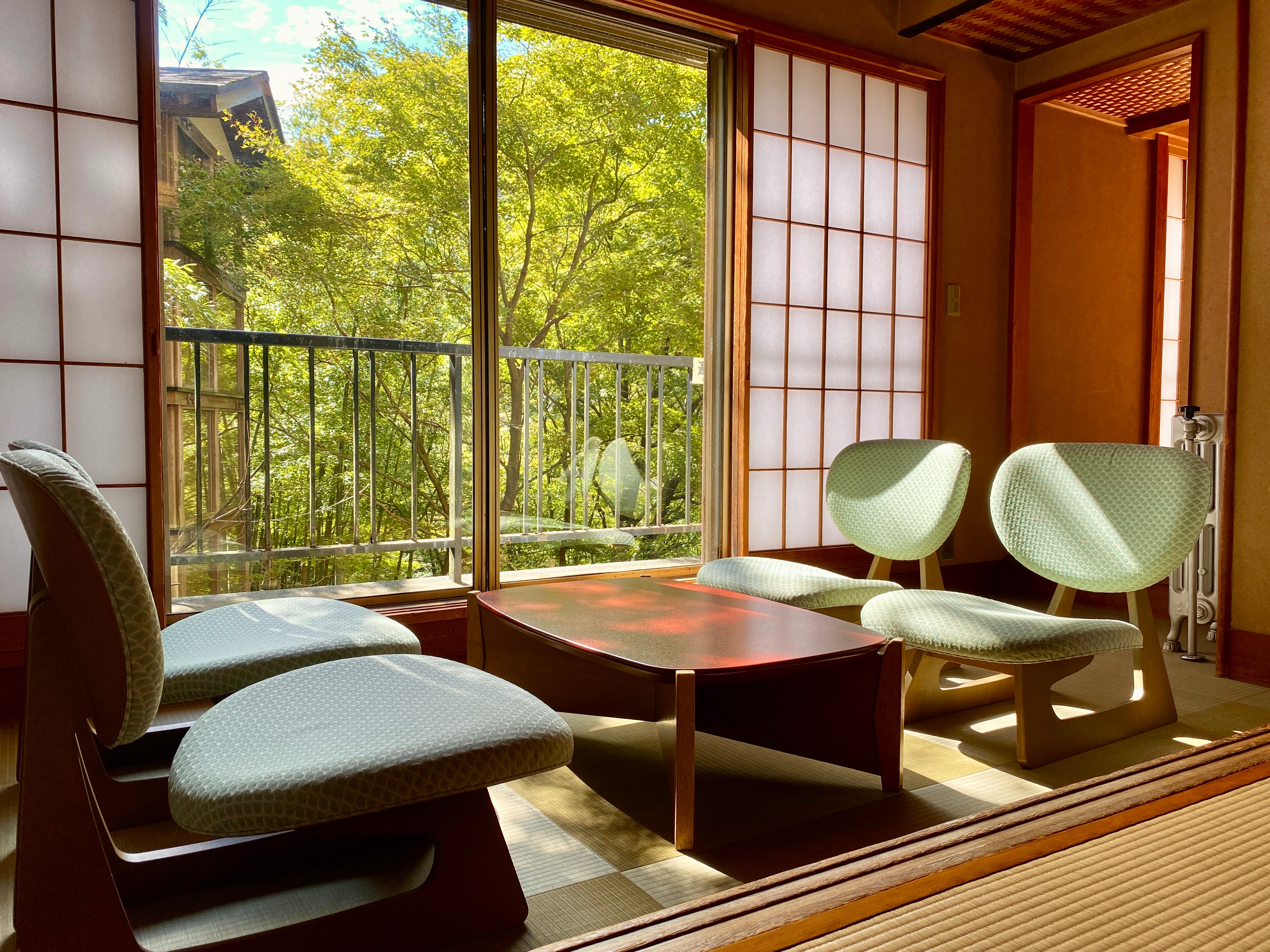 Two 12 tatami mat rooms + a special room with a rock garden and a cypress bath