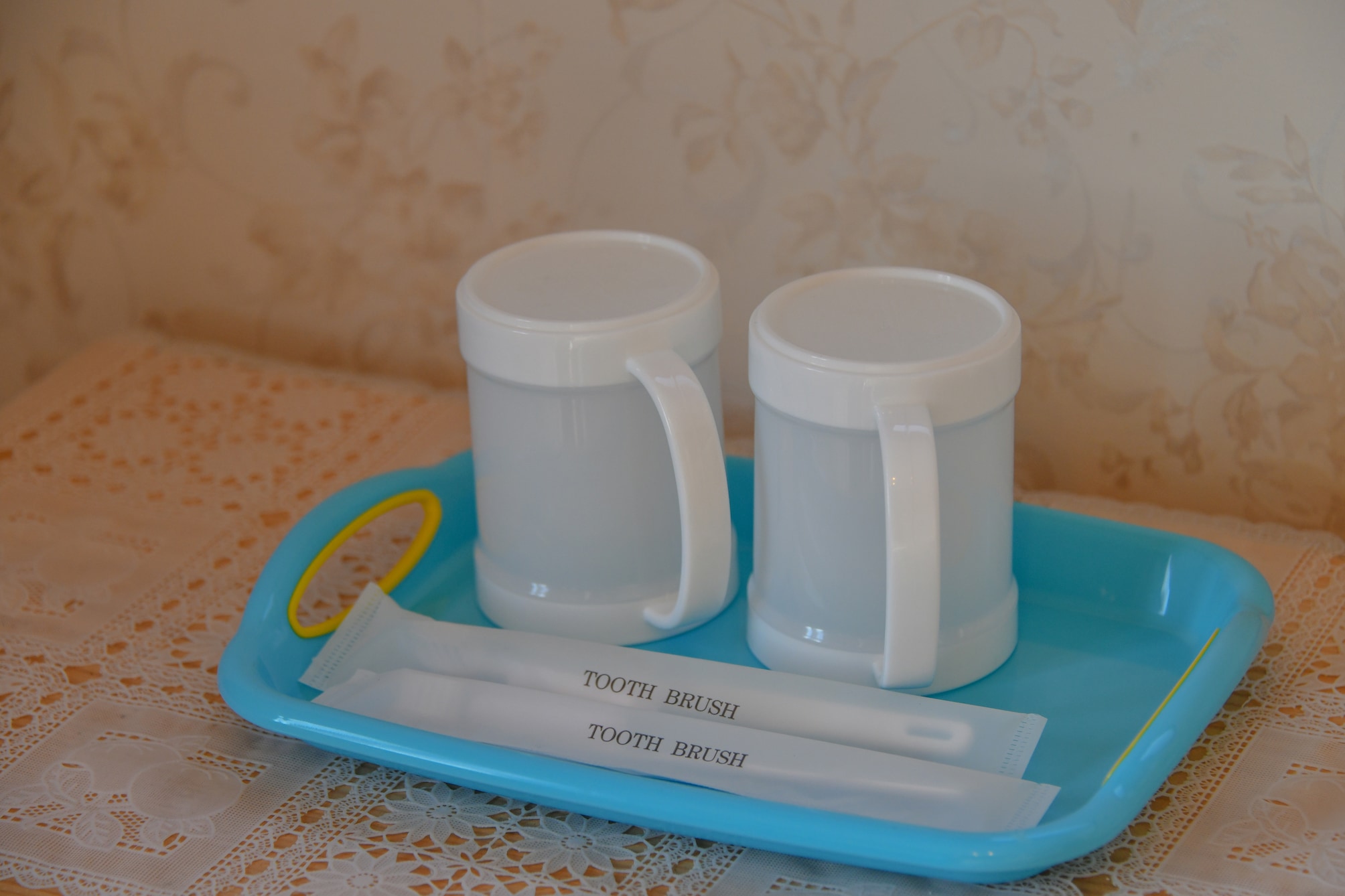 Toothbrush, cup