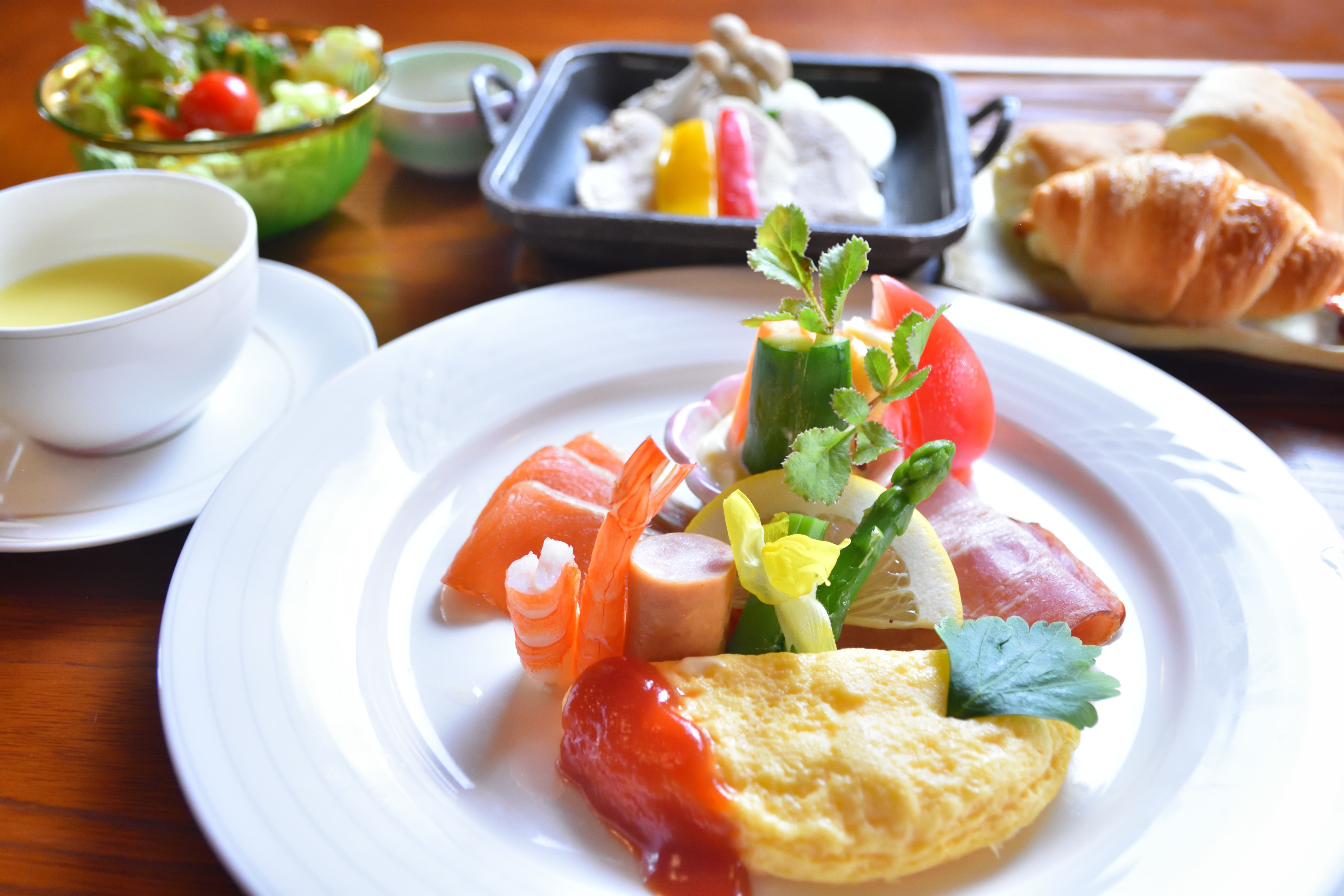 A Western-style breakfast featuring soup and salad.