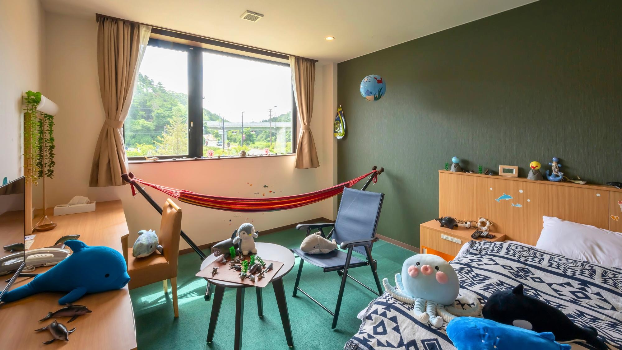 "Creature Room" Enjoy the ocean wave projector and hammocks, and lose track of time as you feel like you're at the sea.