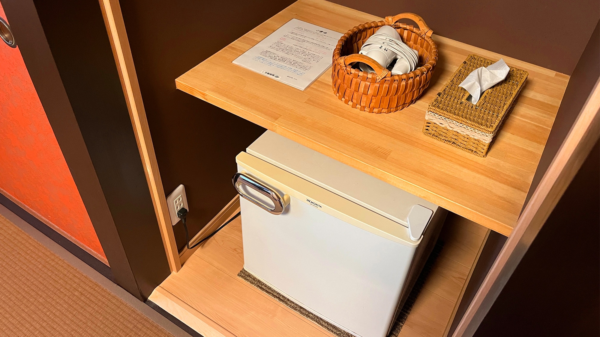 Each room is equipped with a refrigerator.