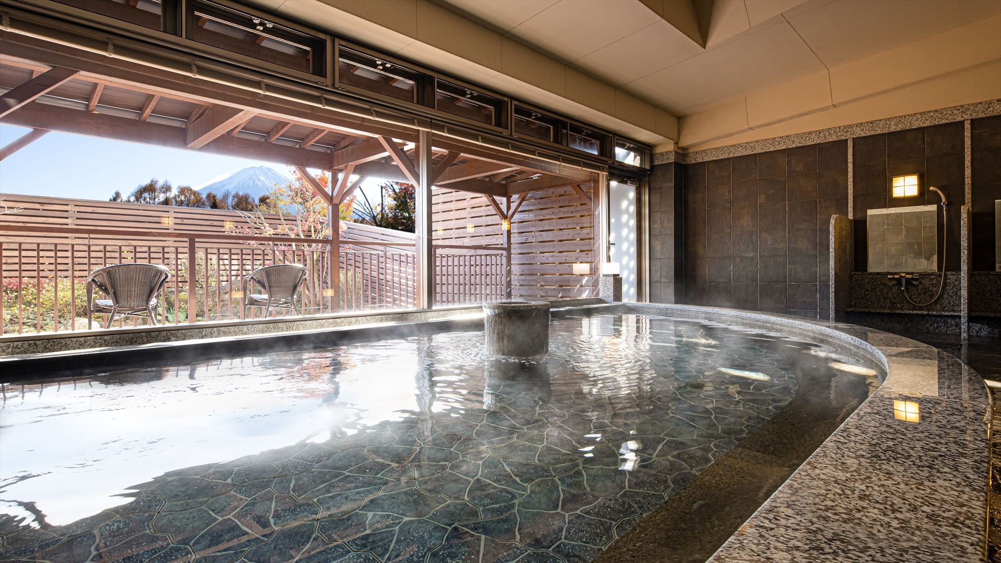 Hot spring large communal bath with a view of Mt. Fuji