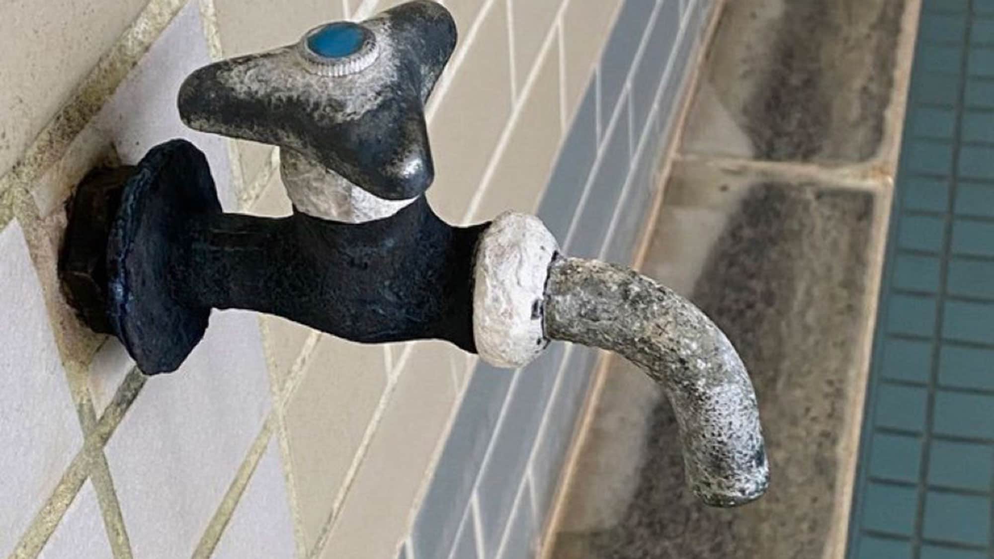 Faucet discolored by hot spring ingredients