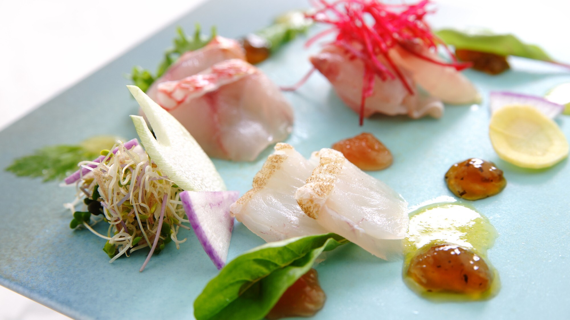 Seafood from the Izu coastline served as sashimi with vegetables from Mishima, the western foot of Hakone