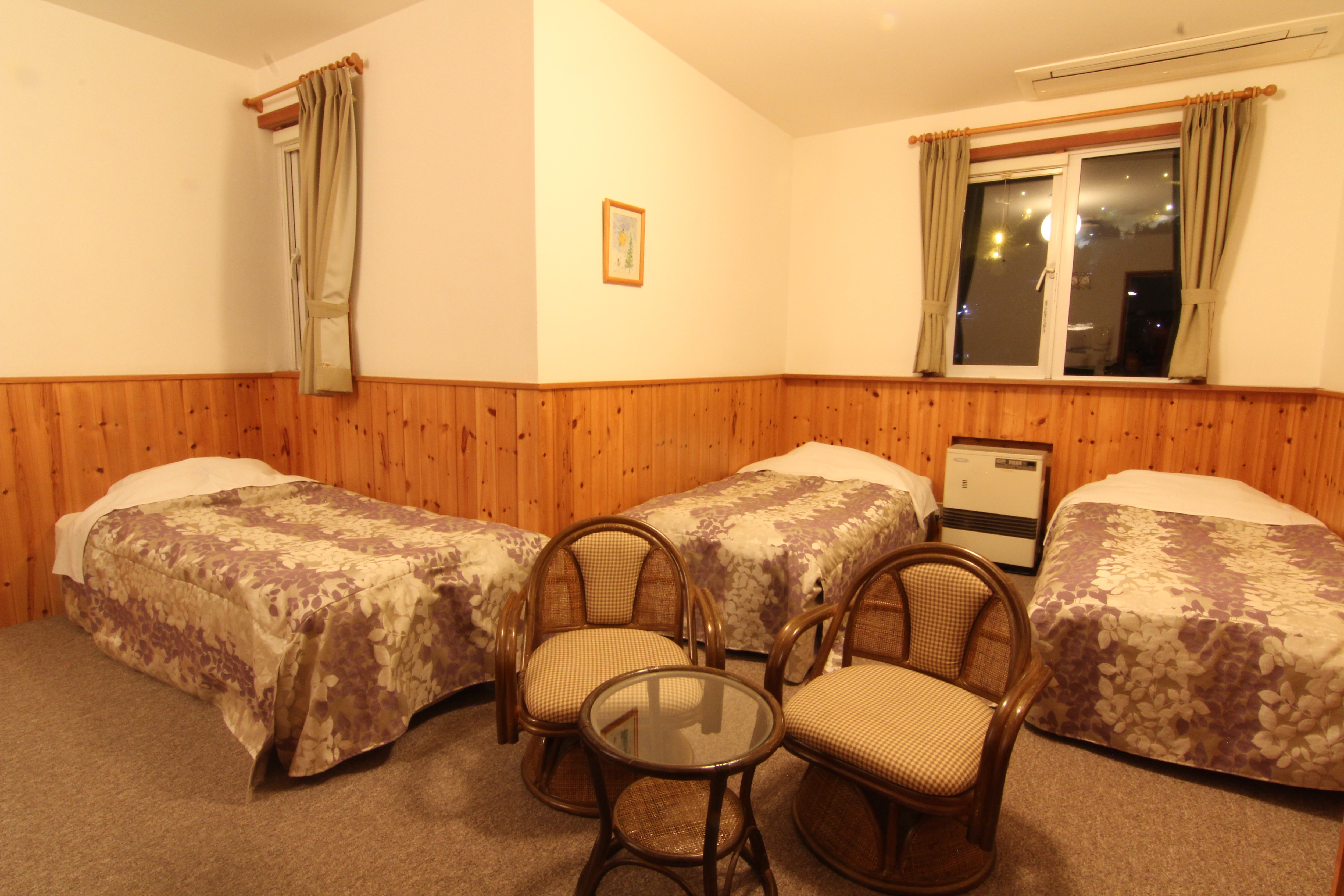 Triple room. All rooms have a toilet and sink. Enjoy a fun time with your family and friends.