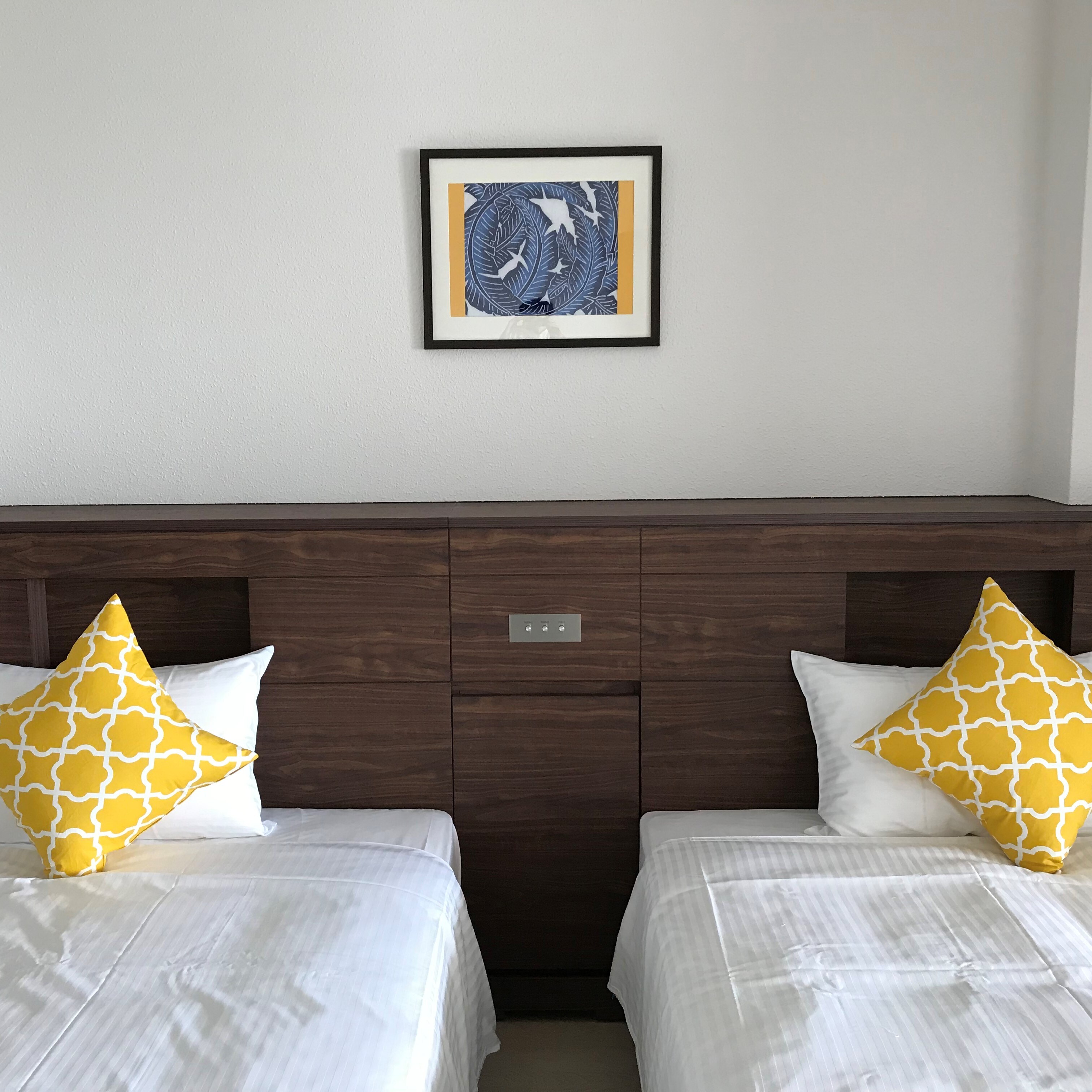 The headboard is fully equipped with an outlet and USB