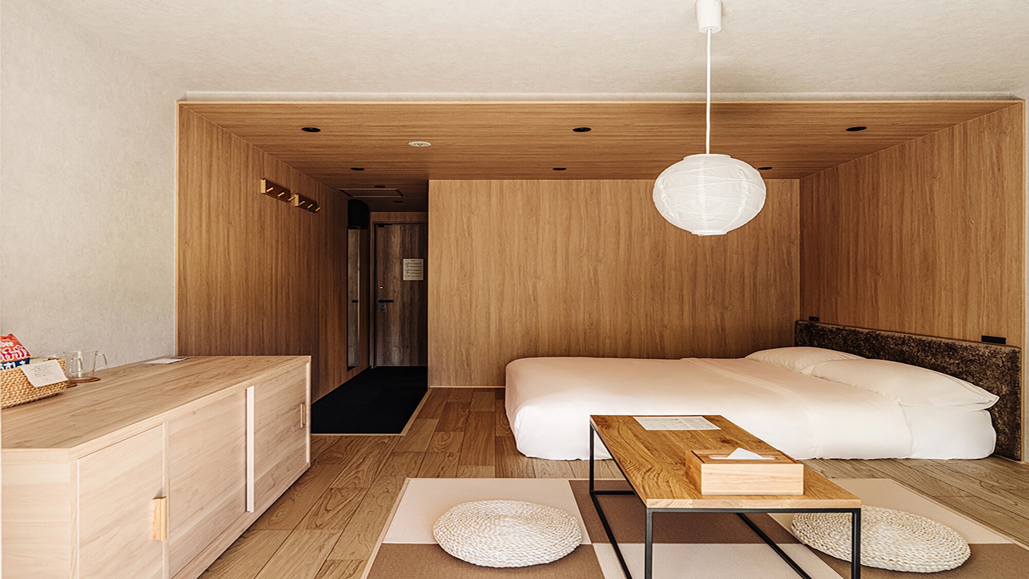 A standard double room with a comfortable, modern Japanese feel, made from natural materials.
