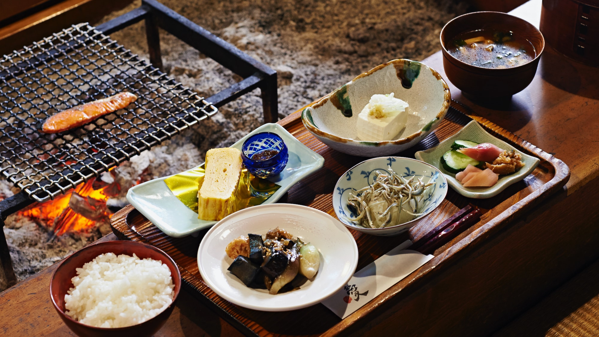 Salmon grilled over a charcoal fire in the hearth will wake everyone up ~ Breakfast example ~