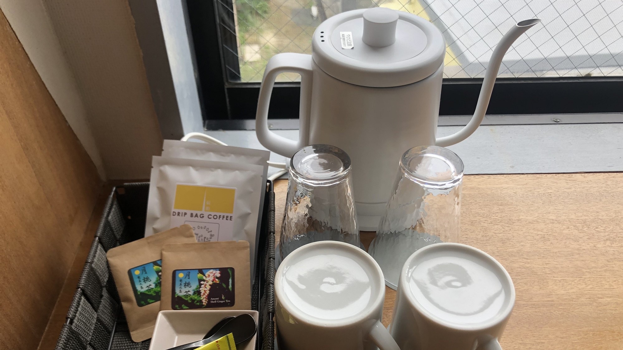 In-room tea set and other items are available in the room.