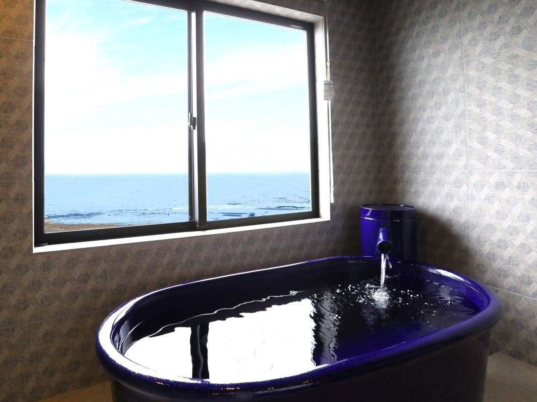 Bed with semi-open-air bath on the sea side Room A type-A moment with a spectacular view