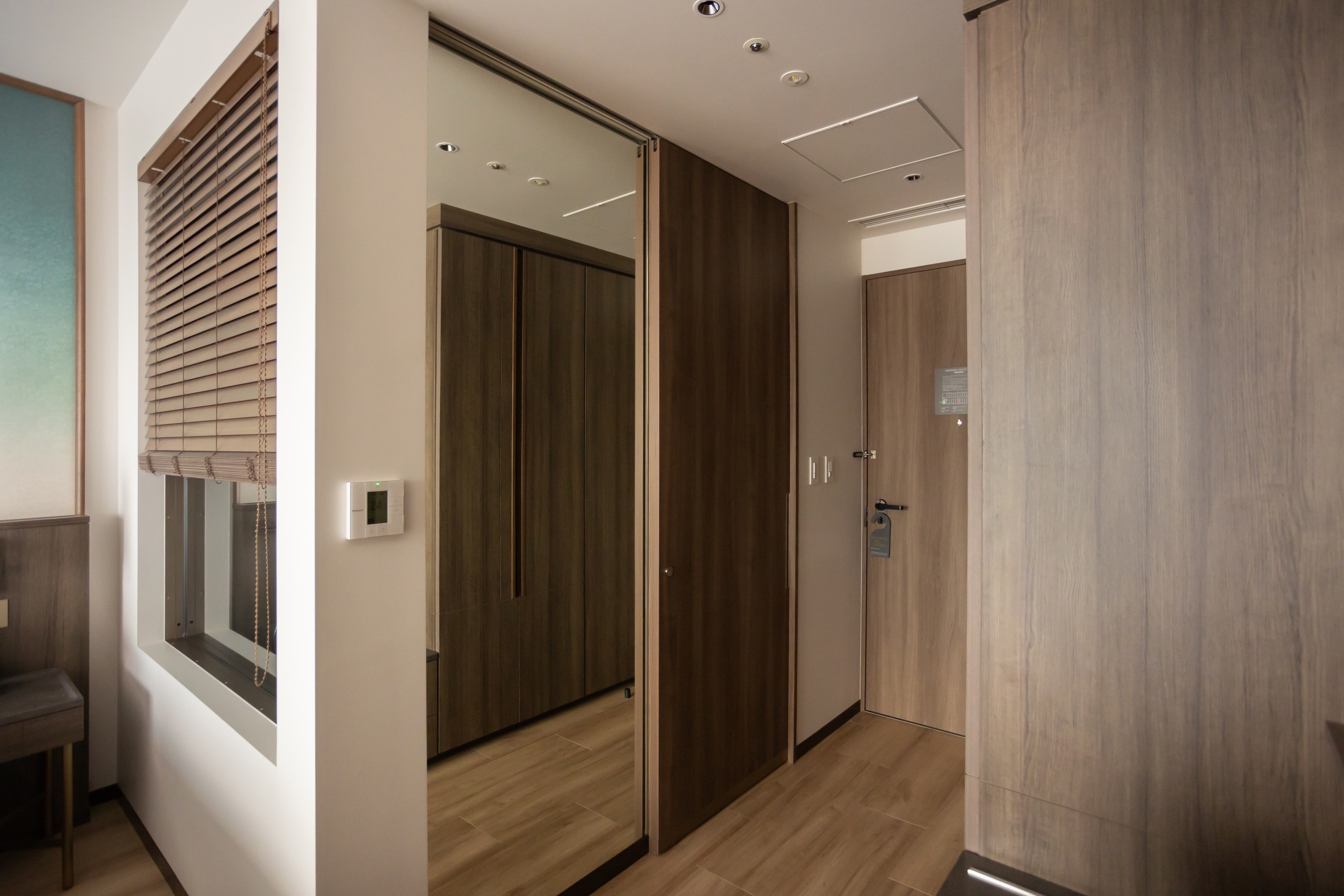 Full-length mirror in guest room