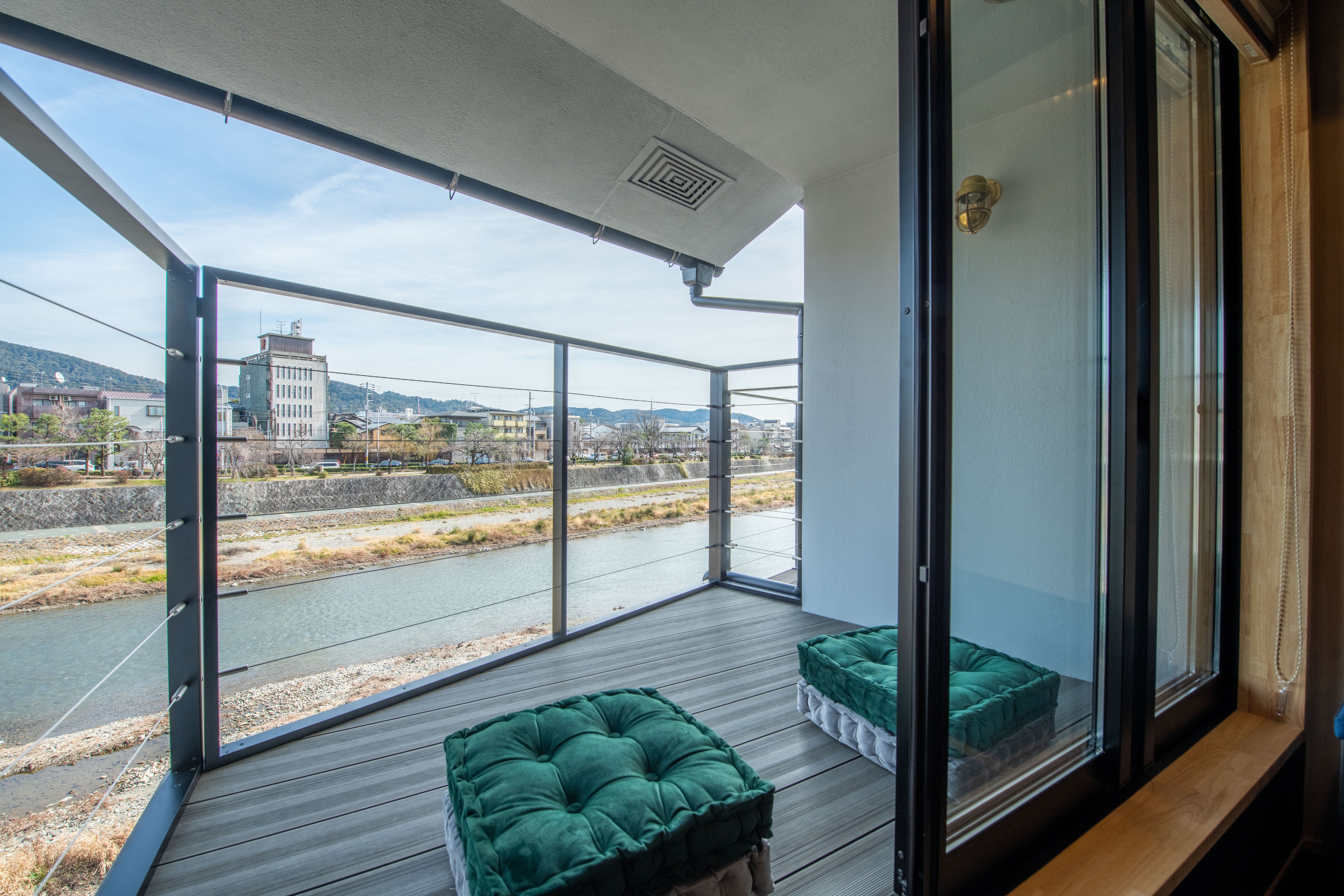 Balcony on the edge of the Kamo River on the second floor