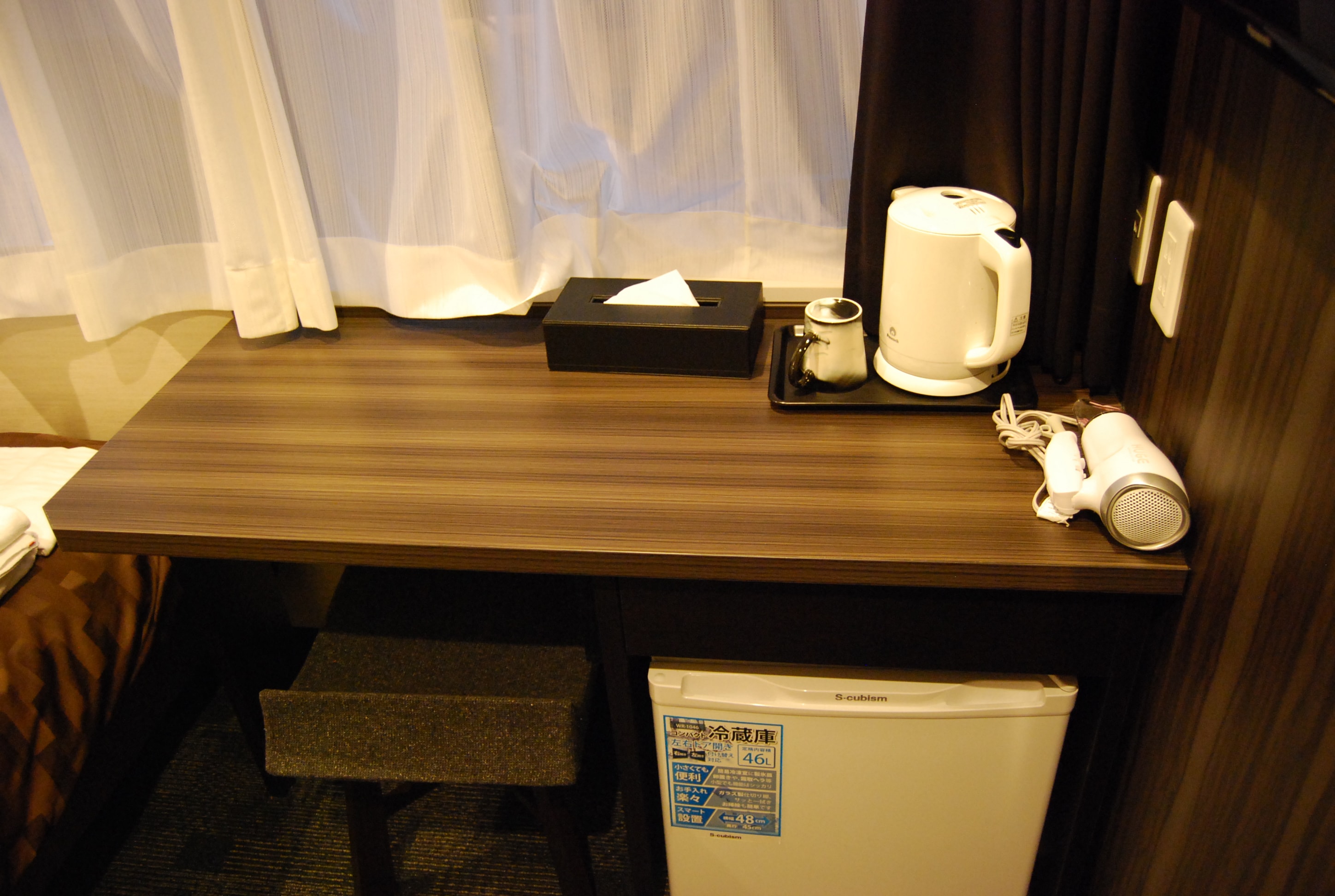 Compact guest room desk