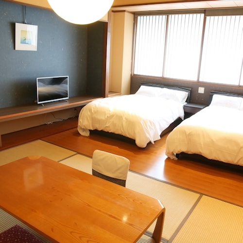 Special Japanese-Western room (9.8m² Western-style room + 6 tatami Japanese-style room) *No bath, toilet included