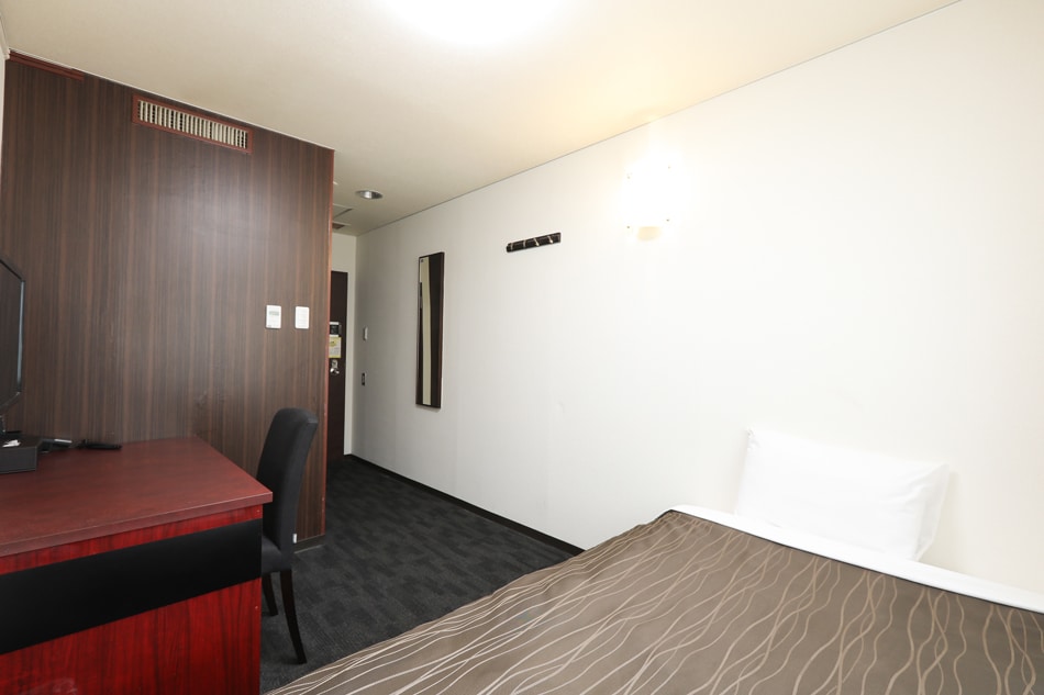 11 square meters & bed width 120 cm, which is a little wider in a business hotel.