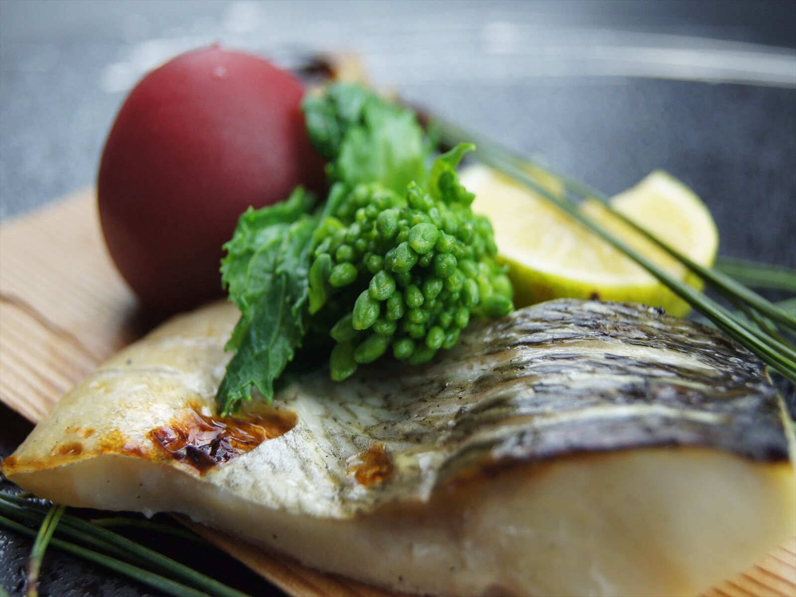 Shinano snow trout grilled on a cedar board in a Yuzuan style