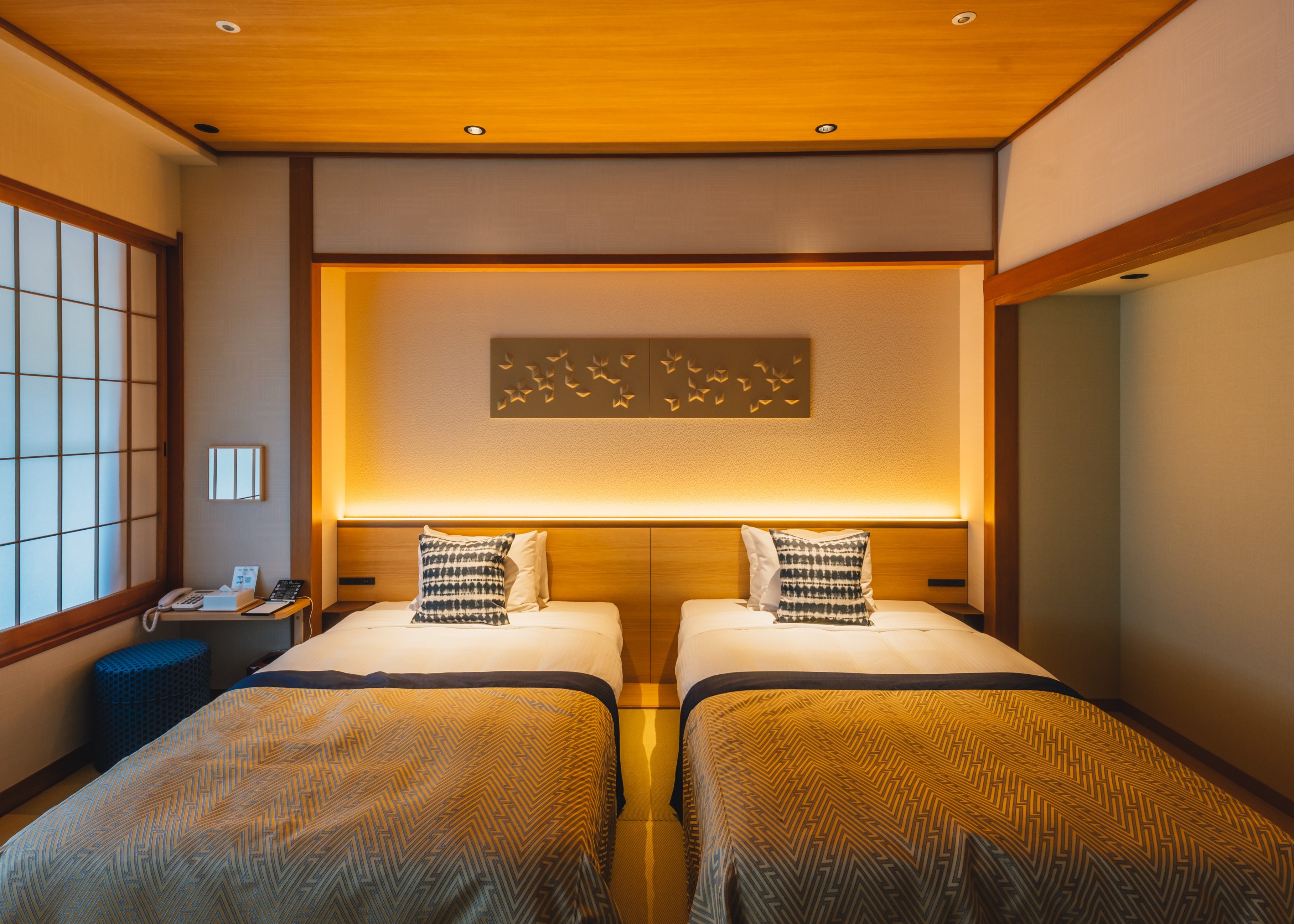A completely renovated premium twin room with an open-air bath