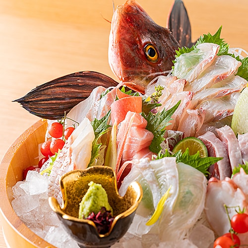 A bucket of local fish